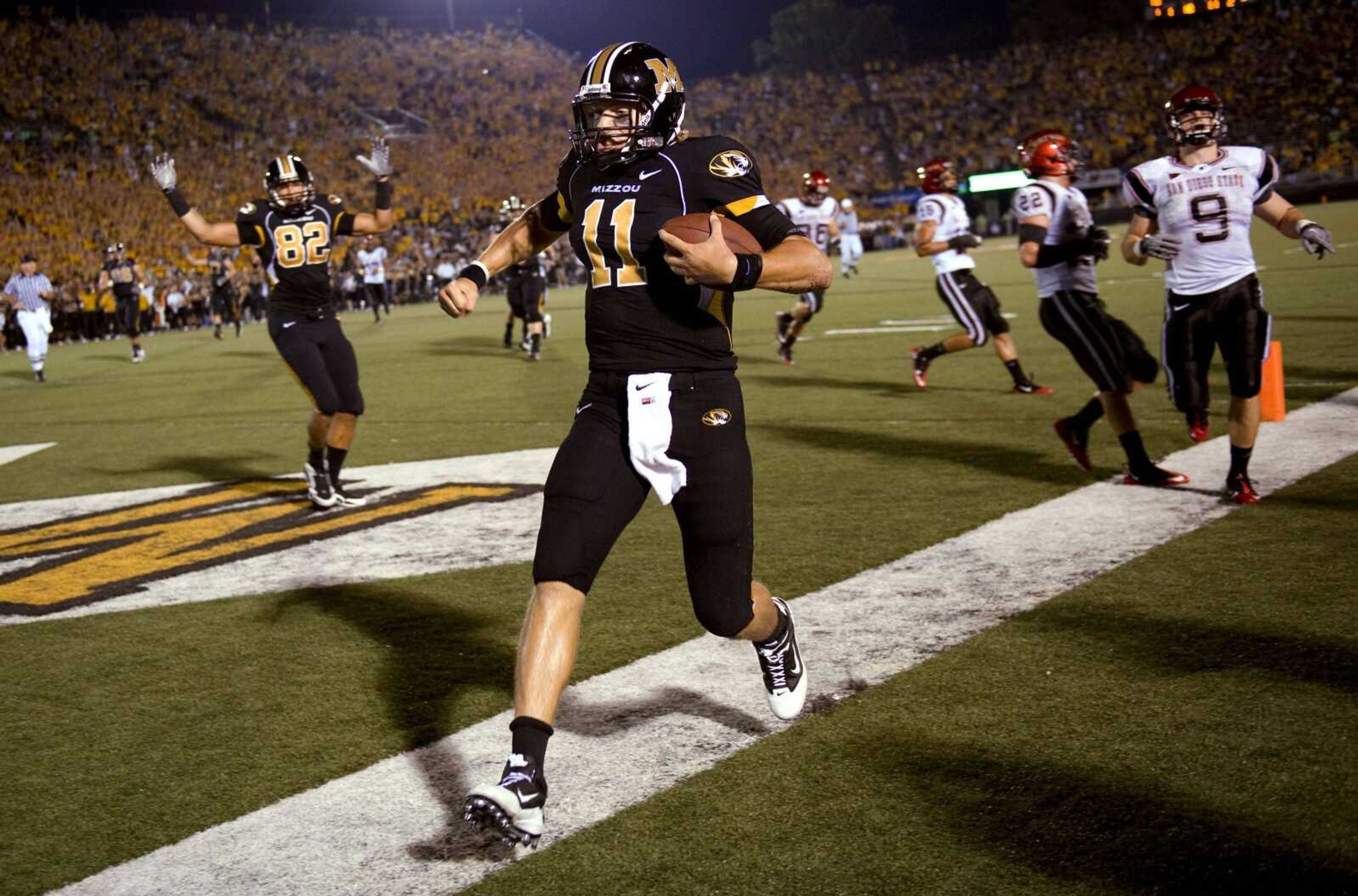 Missouri quarterback Blaine Gabbert celebrates an 11-yard touchdown run against San Diego State during the second quarter Saturday in Columbia, Mo. (L.G. PATTERSON ~ Associated Press)