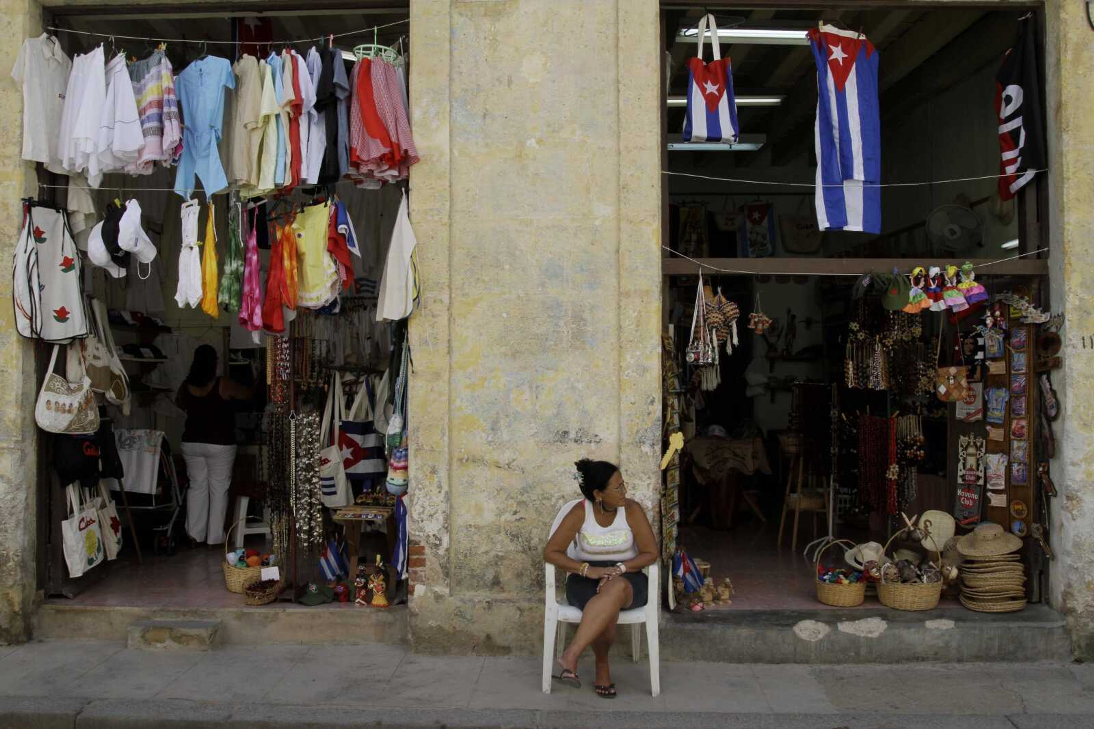 A woman waits for customers Monday at a souvenir store in Havana. (Franklin Reyes ~ Associated Press)