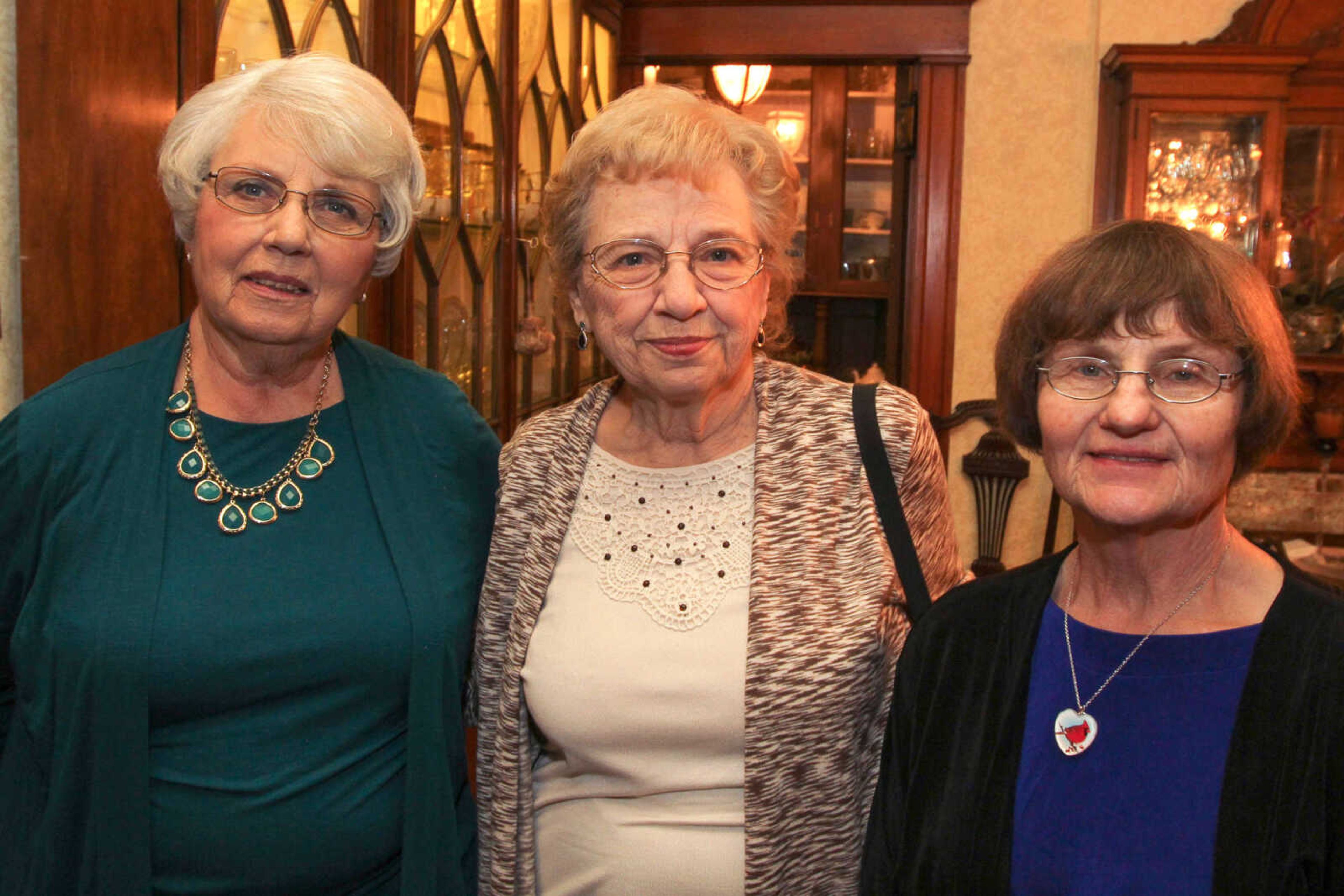 GLENN LANDBERG ~ glandberg@semissourian.com

Vicki Outman, left, Anita Dickerson and Linda Buis pose for a photo during the second annual Dingeldein Gala at the Oliver-Leming House Friday, Jan. 16, 2014. Outman and Buis are former winners of the Otto F. Dingeldein award.