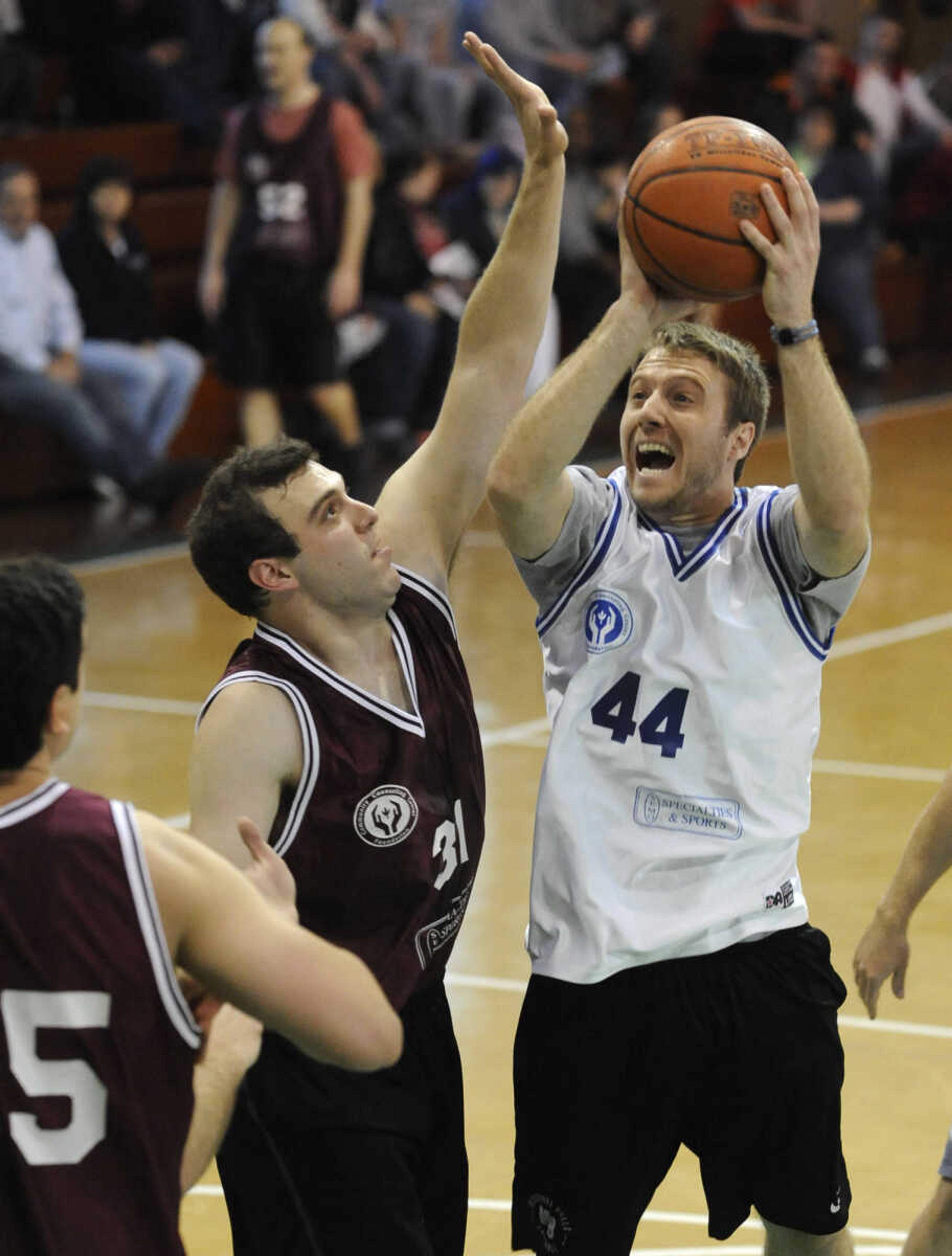 FRED LYNCH ~ flynch@semissourian.com
Ryne "I See You" Wood shoots for the Doctors against the Lawyers' Jake "The Ringer" Luria during the Doctors vs. Lawyers Basketball Showdown on Saturday, March 22, 2014 at the DePaul Center in Cape Girardeau.