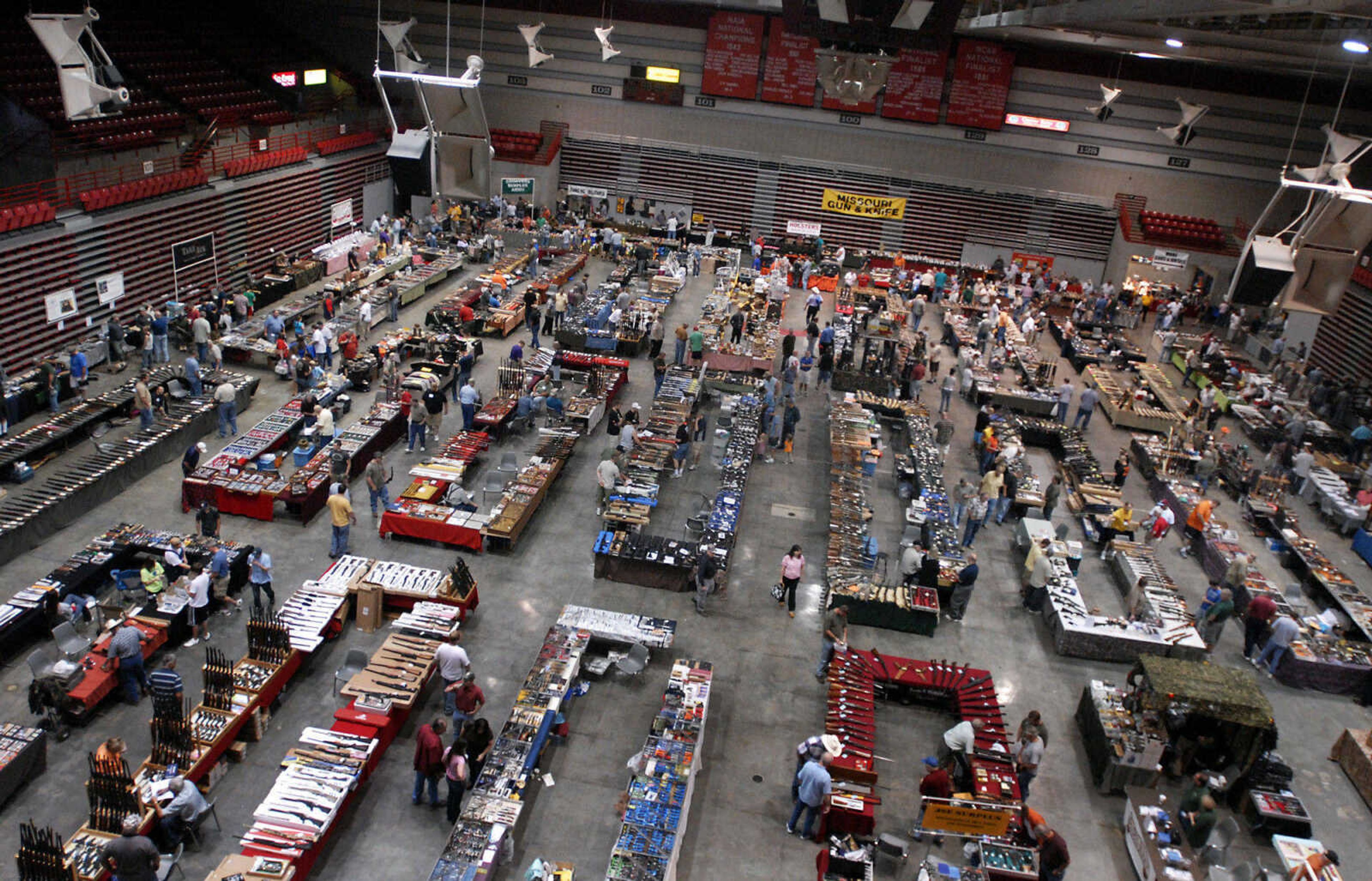 KRISTIN EBERTS ~ keberts@semissourian.com

Vendors line the floor during the Missouri Gun and Knife Show on Saturday, Sept. 25, 2010, at the Show Me Center in Cape Girardeau.