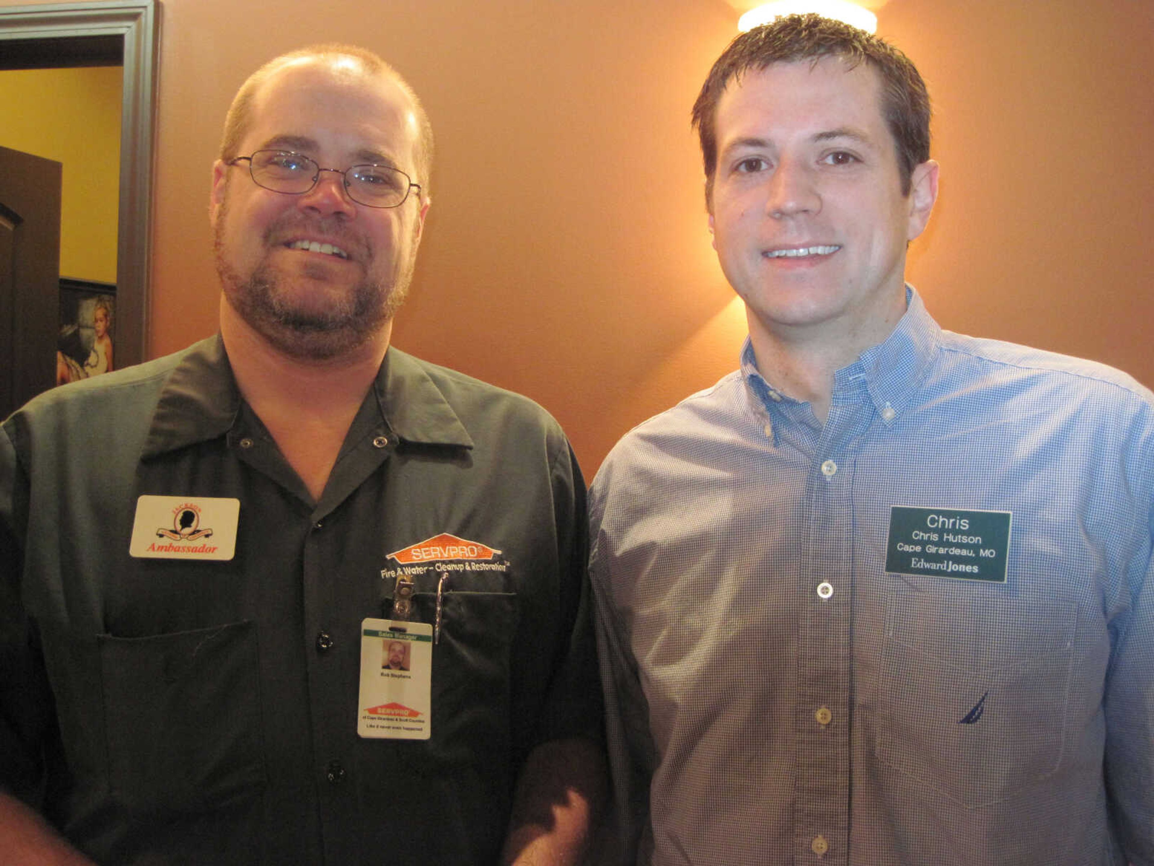 Rob Stephens and Chris Hutson attend the Jackson Chamber of Commerce Business Breakfast at Creative Edge on Friday, April 9, 2010.