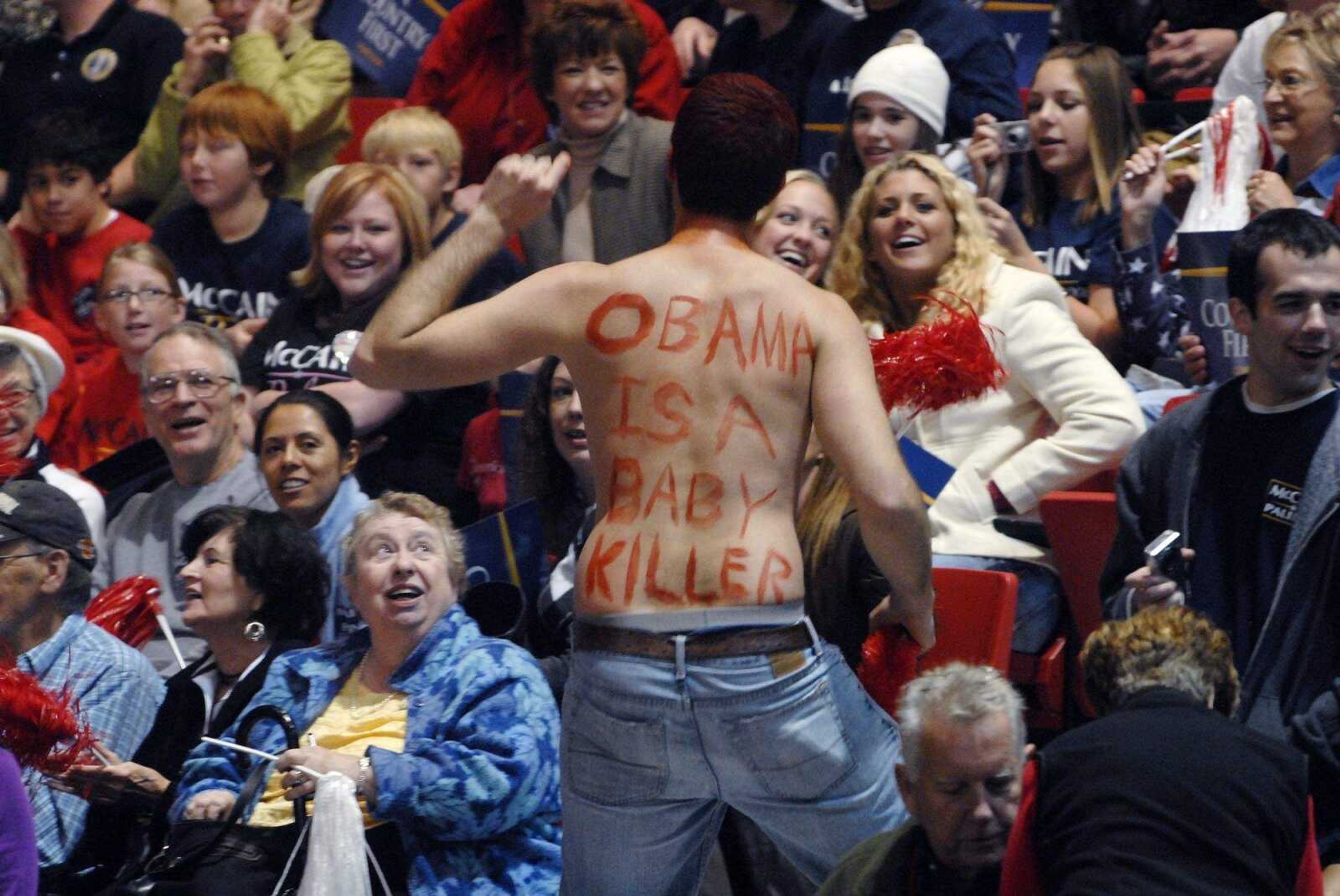 CHUCK WU ~ cwu@semissourian.com
A supporter for the Republican party tries to rally up the crowd before Sarah Palin's speech.