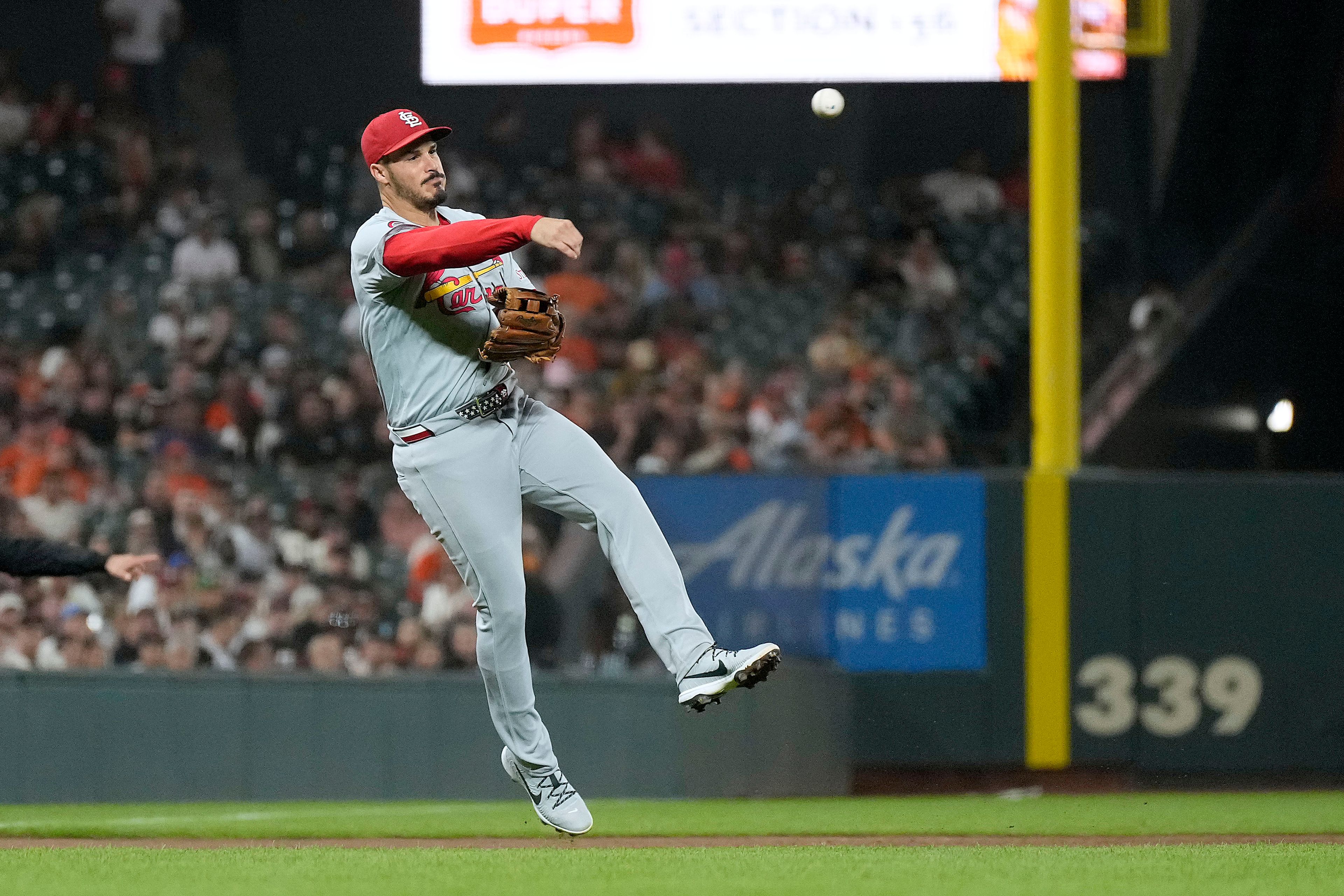 St. Louis Cardinals third base Nolan Arenado throws to first base on the ground out by San Francisco Giants' Matt Chapman during the fifth inning of a baseball game Friday, Sept. 27, 2024, in San Francisco. (AP Photo/Tony Avelar)