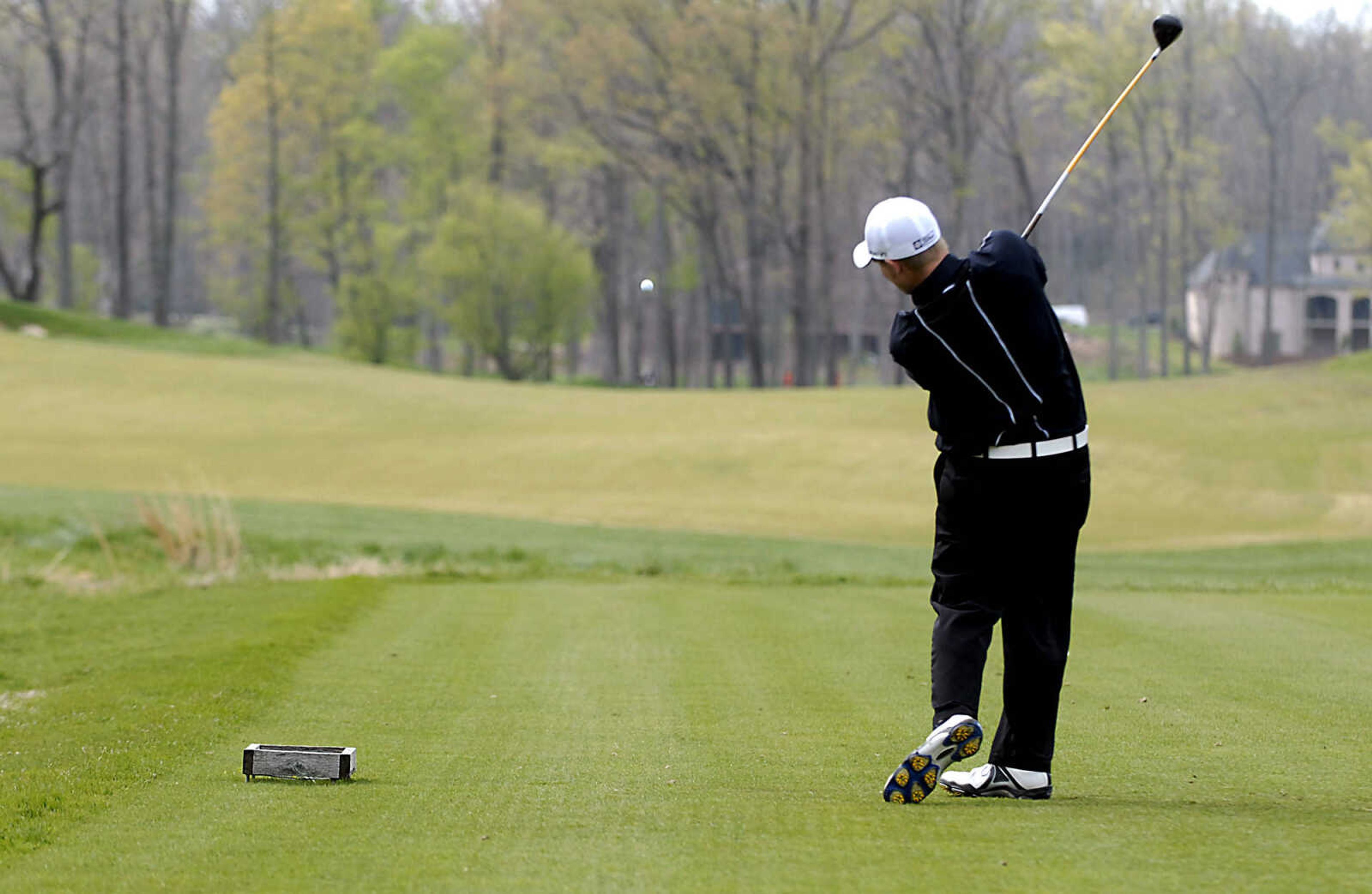 KIT DOYLE ~ kdoyle@semissourian.com
Central's Tim Simmons drives off on the second tee Thursday, April 16, 2009, during the Saxony Lutheran Invitational at Dalhousie Golf Club in Cape Girardeau.