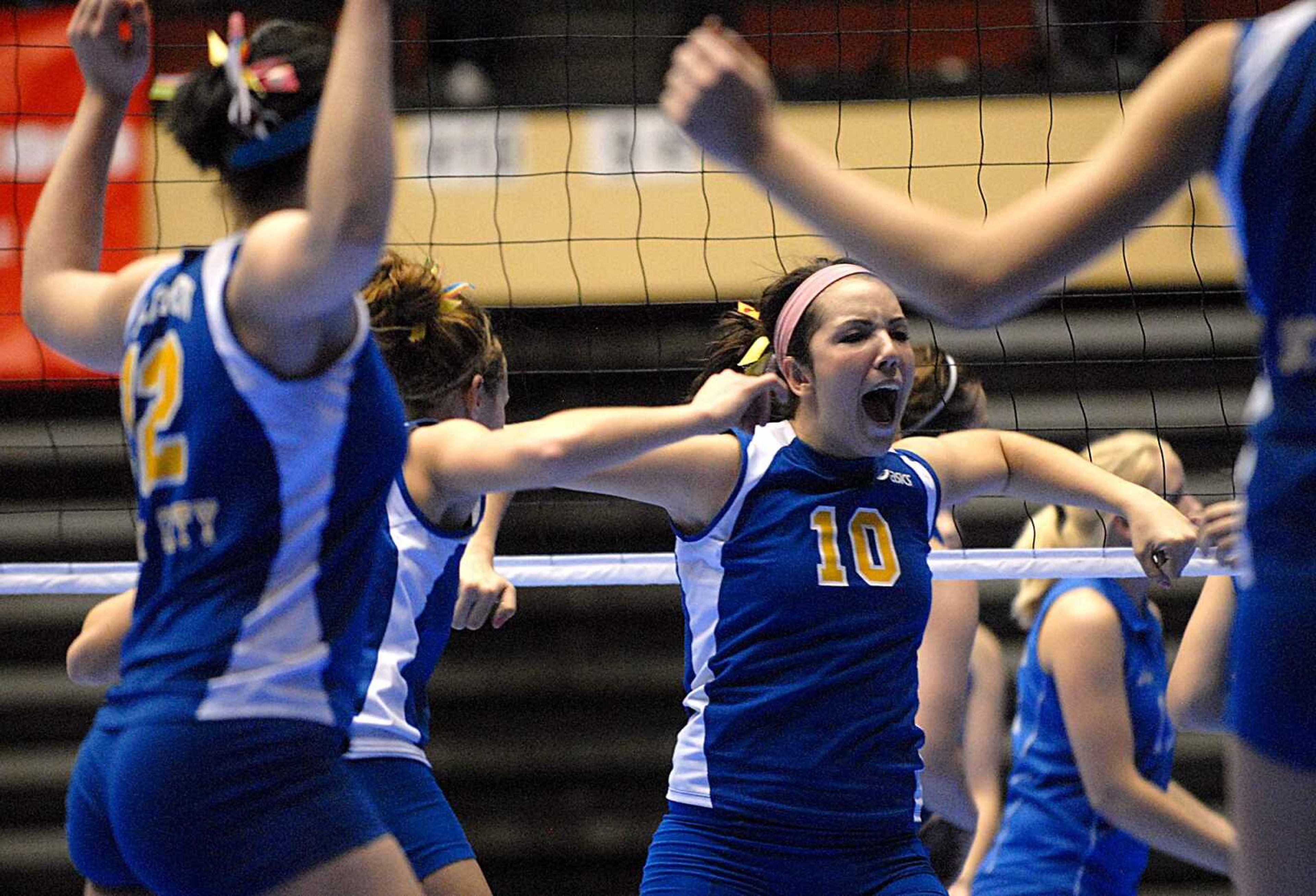 AARON EISENHAUER ~ aeisenhauer@semissourian.com
Brooke Simpson and her Scott City teammates celebrate a kill against Cole Camp during the Class One state semi-finals on Thursday, November 7, 2008 in Kansas City.  The team earned placement in Saturday's championship game.