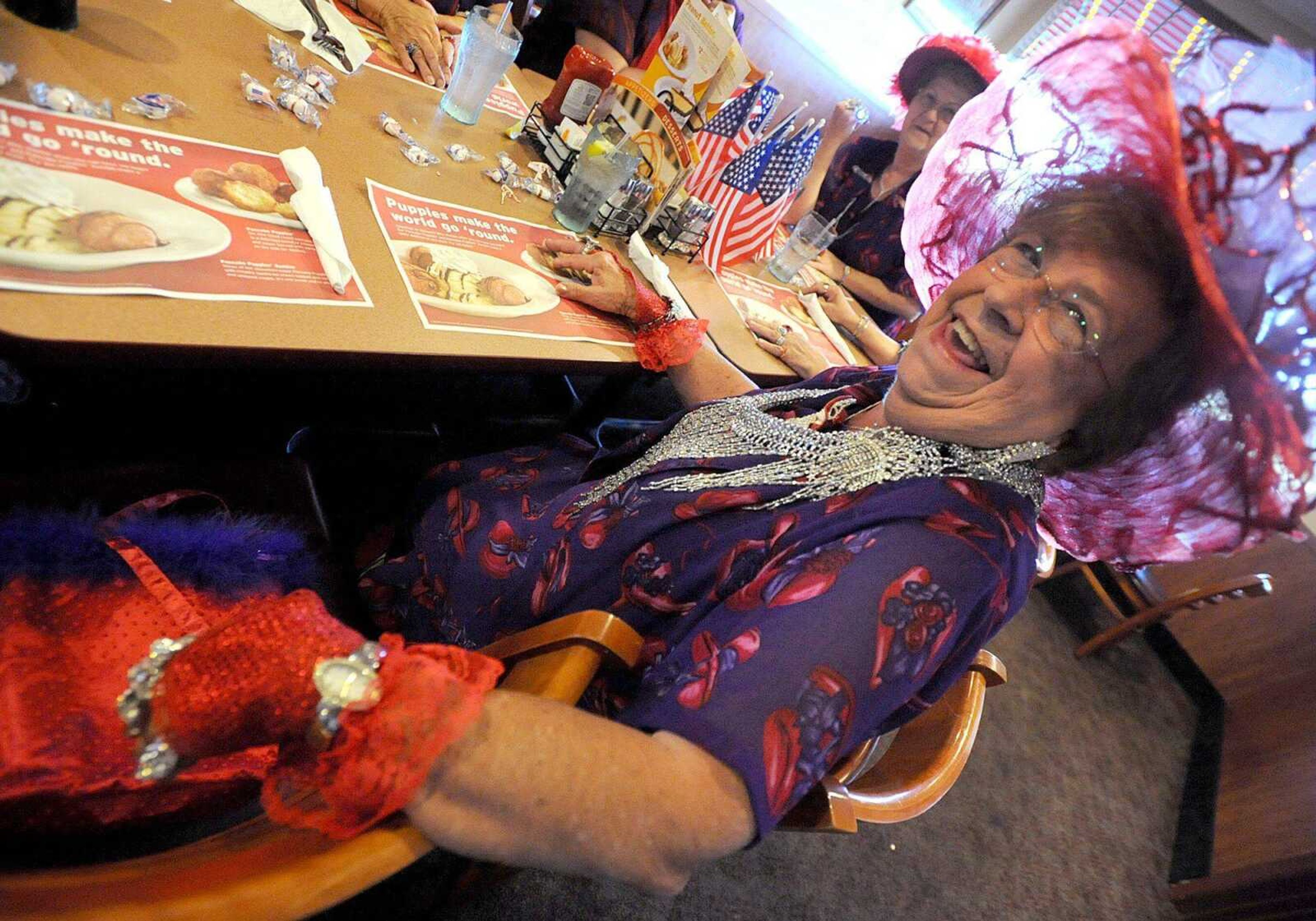 Elsie Eggimann has a laugh Tuesday, May 29, 2012 during the monthly meeting of the Classy Sassy Chicks chapter of the Red Hat Society (Laura Simon)