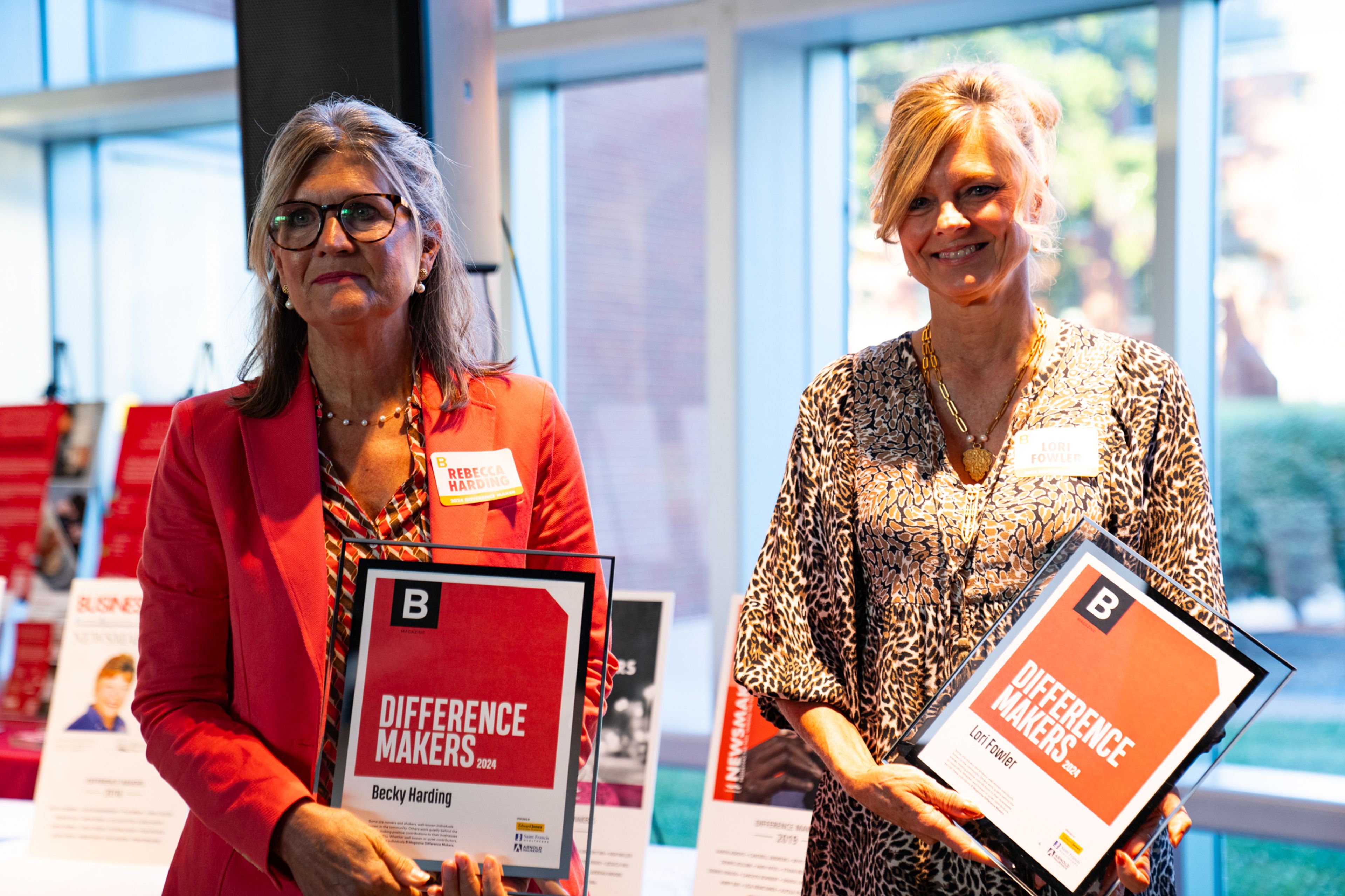 Becky Harding and Lori Fowler stand together to be recognized as 2024 Difference Makers at the reception at the River Campus.