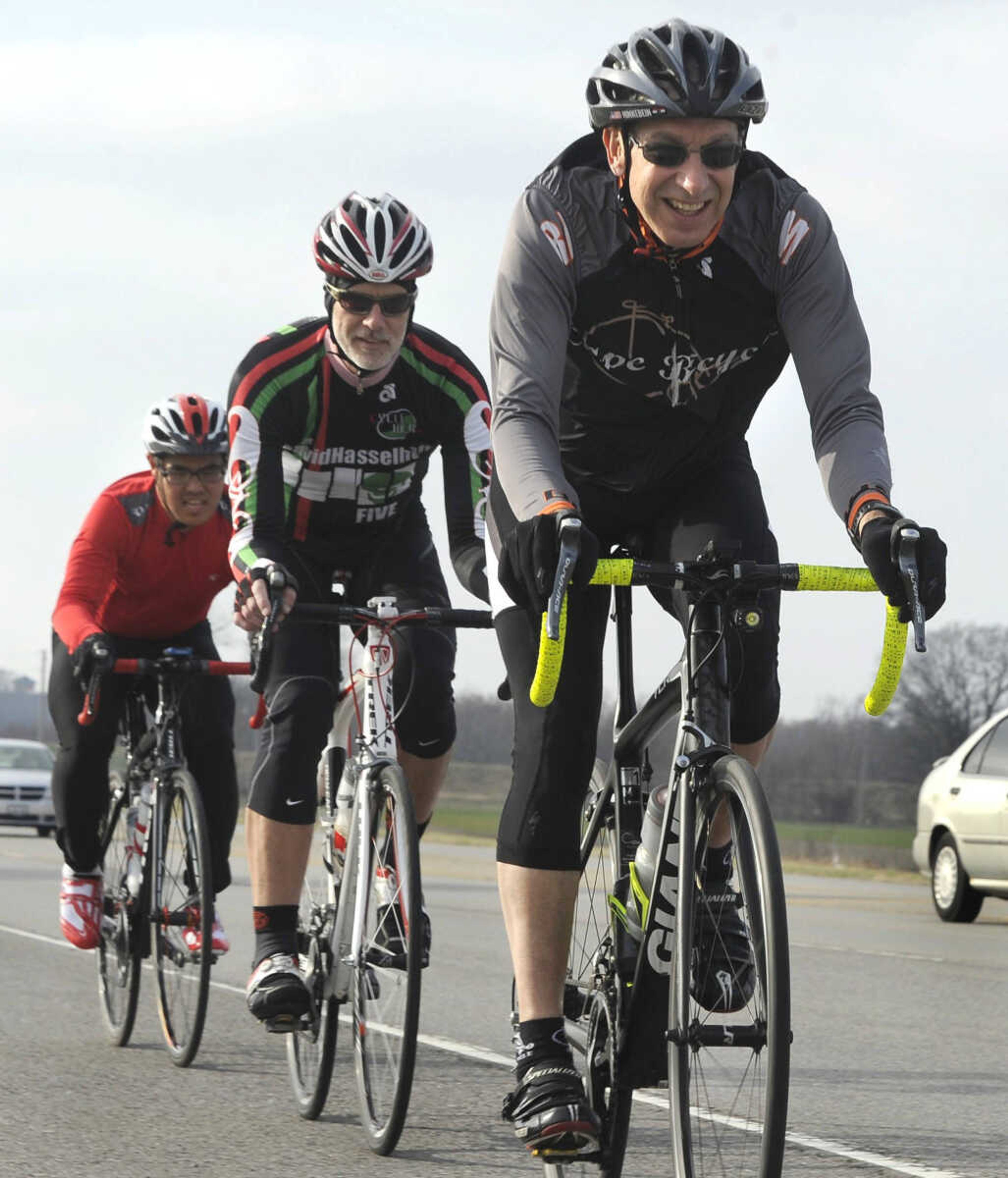 Don Hinkebein, right, leads Jim Summers and J.J. Lee of the Velo Girardeau bicycle club on a ride into Illinois on Sunday from a start in Cape Girardeau. (Fred Lynch)