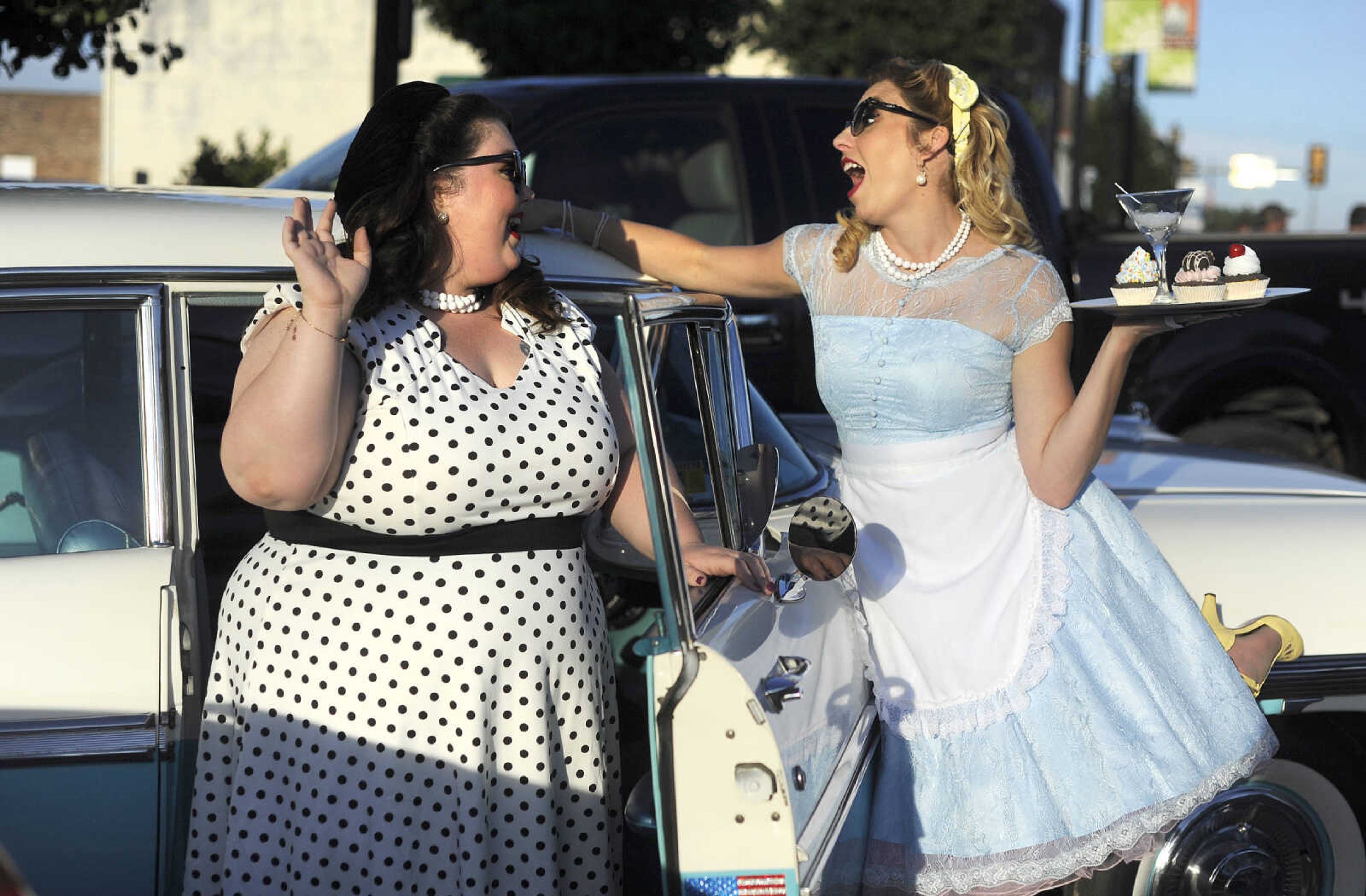 LAURA SIMON ~ lsimon@semissourian.com

Alana Burke and LaKrisha Moore pose for a photo during the Perryville Pin-Up contest on Saturday, Sept 3, 2016, in Perryville, Missouri.