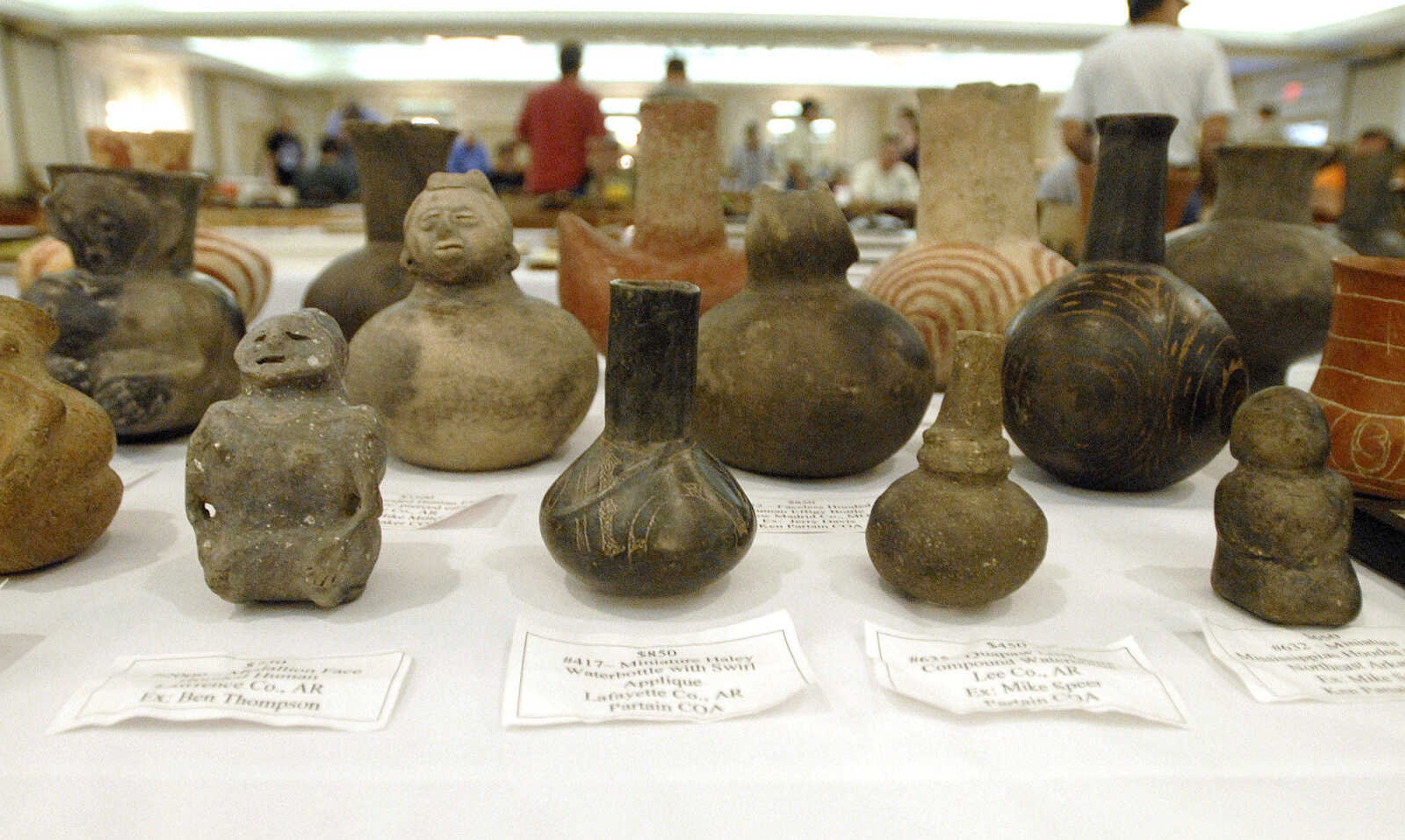 LAURA SIMON ~ lsimon@semissourian.com
Artifacts wait for buyers to find them Sunday, June 26, 2011 during the Bootheel Archeological Society exhibition at Drury Lodge in Cape Girardeau.