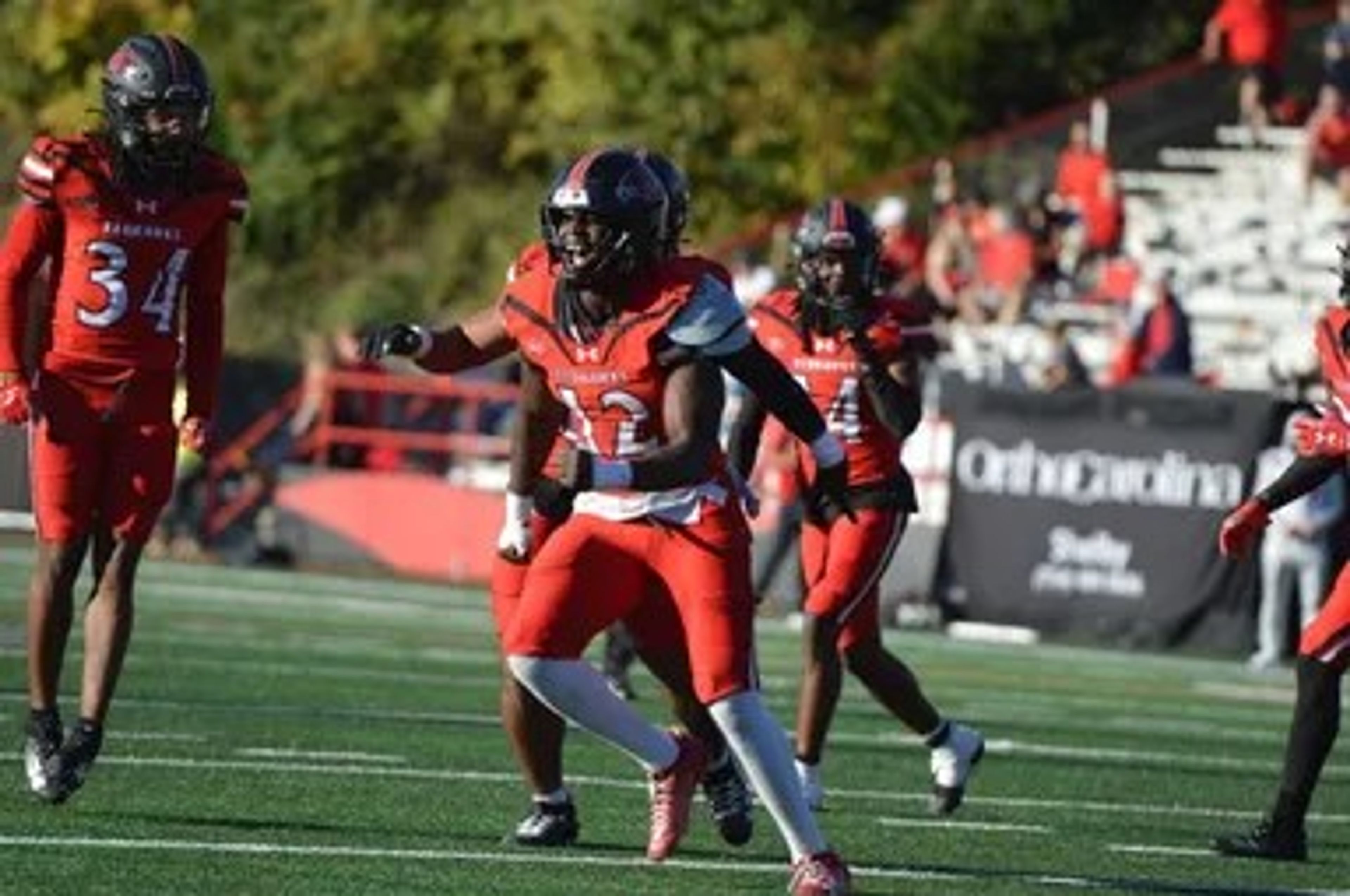 Southeast Missouri State outside linebacker Sam Cook celebrates with his teammates after a big stop against Gardner-Webb on Oct. 26 at Houck Field in Cape Girardeau. 