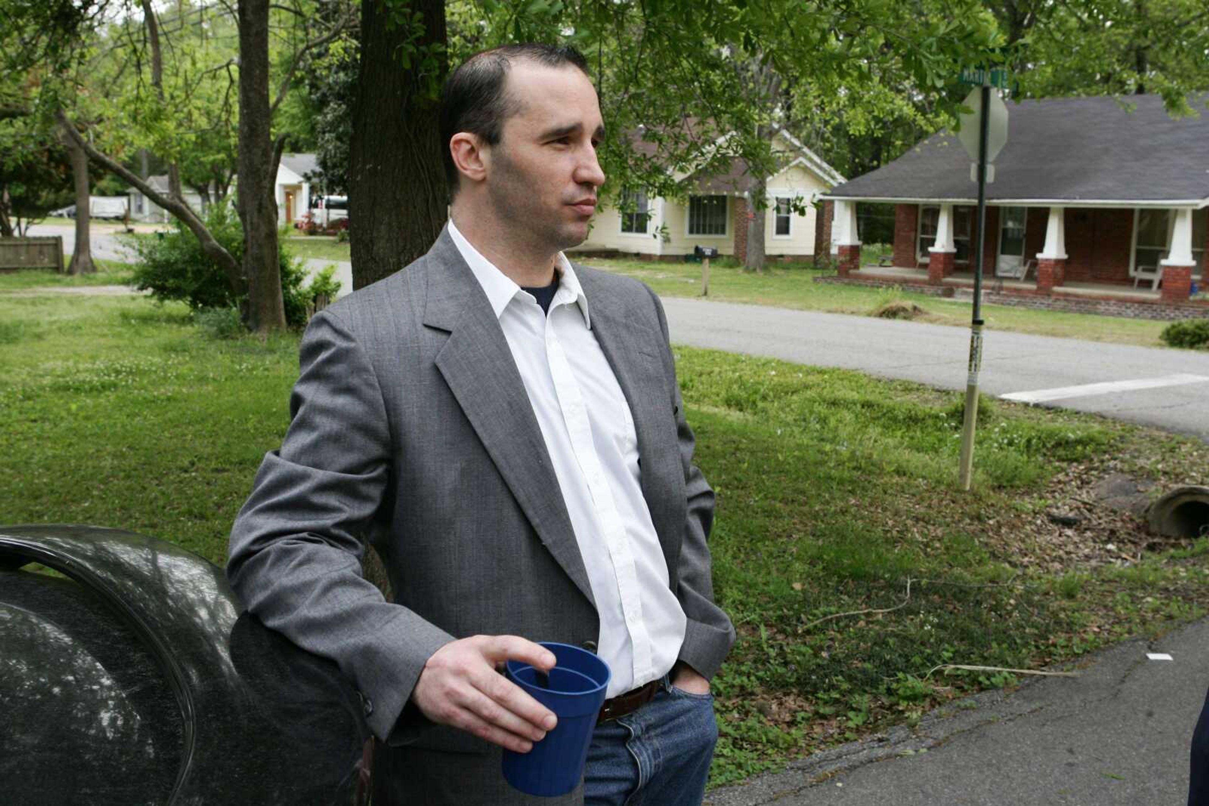 Everett Dutschke stands in the steet near his home in Tupelo, Miss., and waits for the FBI to arrive and search his home Tuesday April 23, 2013 in connection with the sending of poisoned letters to President Barack Obama and others last week. Paul Kevin Curtis, the man charged with sending the letters, was released from jail Tuesday on bond, while FBI agents returned Dutschke's house where they'd previously searched in connection with the case. (AP Photo/Northeast Mississippi Daily Journal, Thomas Wells) MANDATORY CREDIT