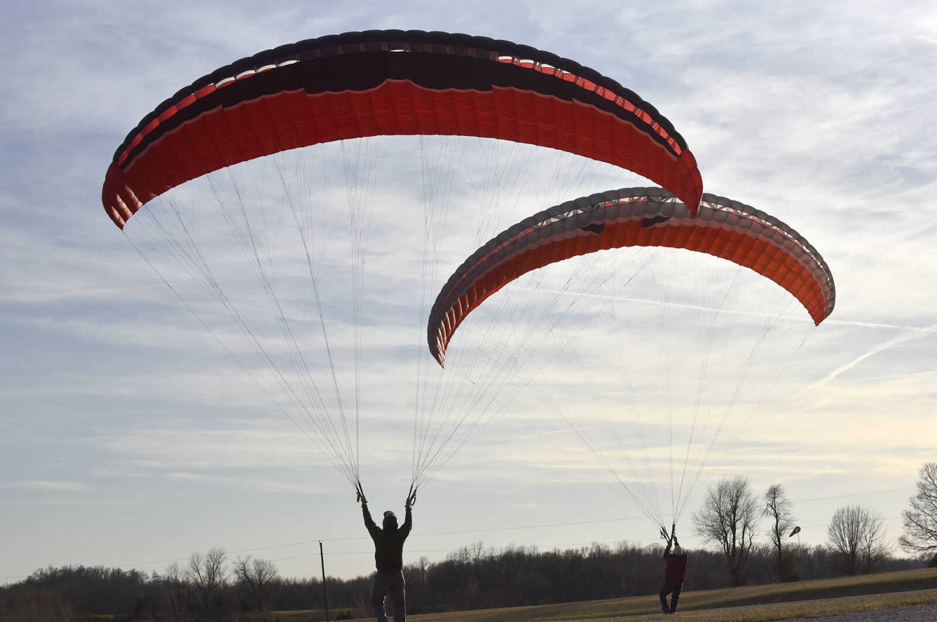 Curt Froemsdorf and Kevin Rampley practice their kiting skills on Wednesday, Feb. 1, 2017, at the Fruitland International Airport in Jackson.