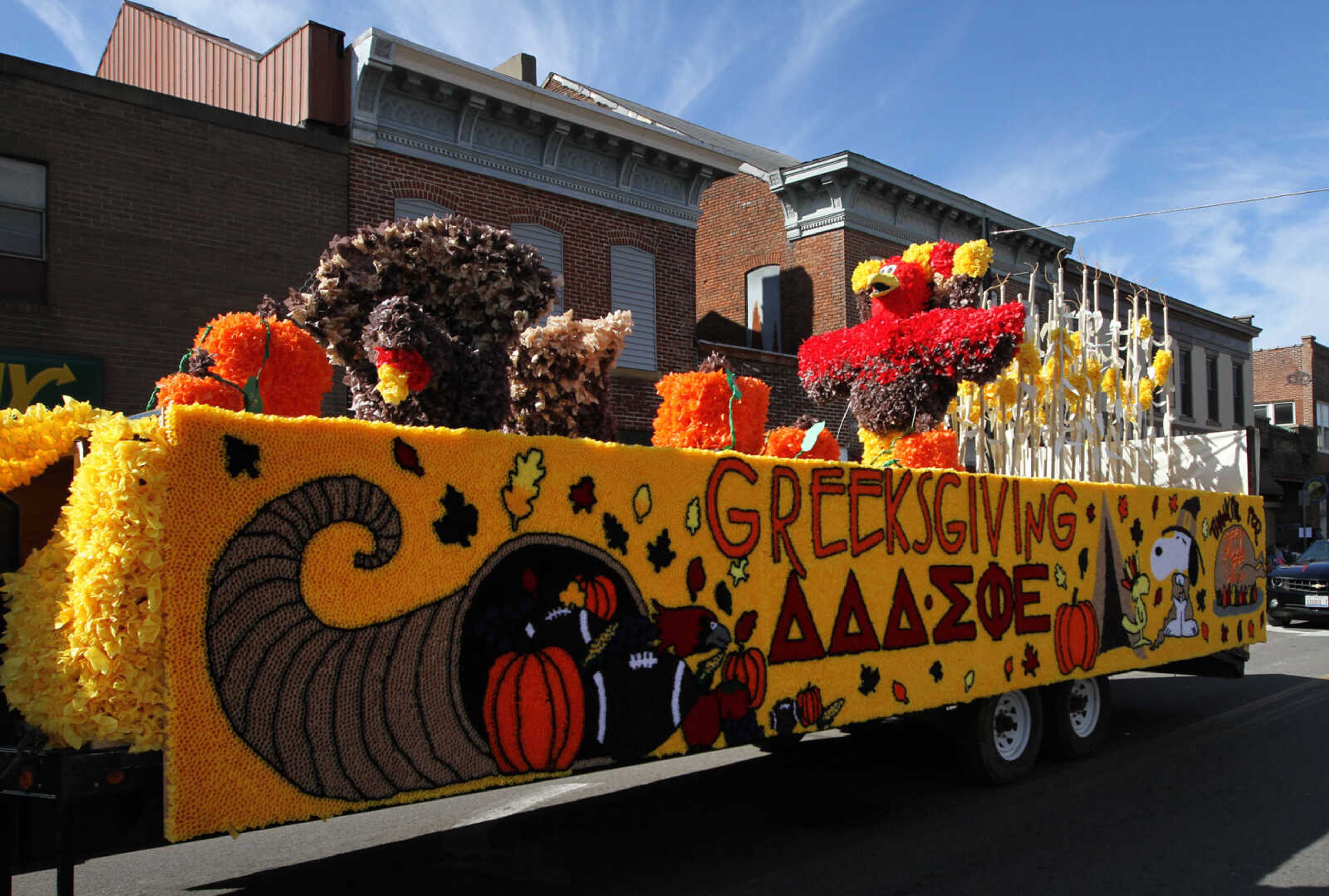 GLENN LANDBERG ~ glandberg@semissourian.com

The Southeast Missouri State University homecoming parade moves down Broadway St. in Cape Girardeau Saturday Morning, Oct. 4, 2014.