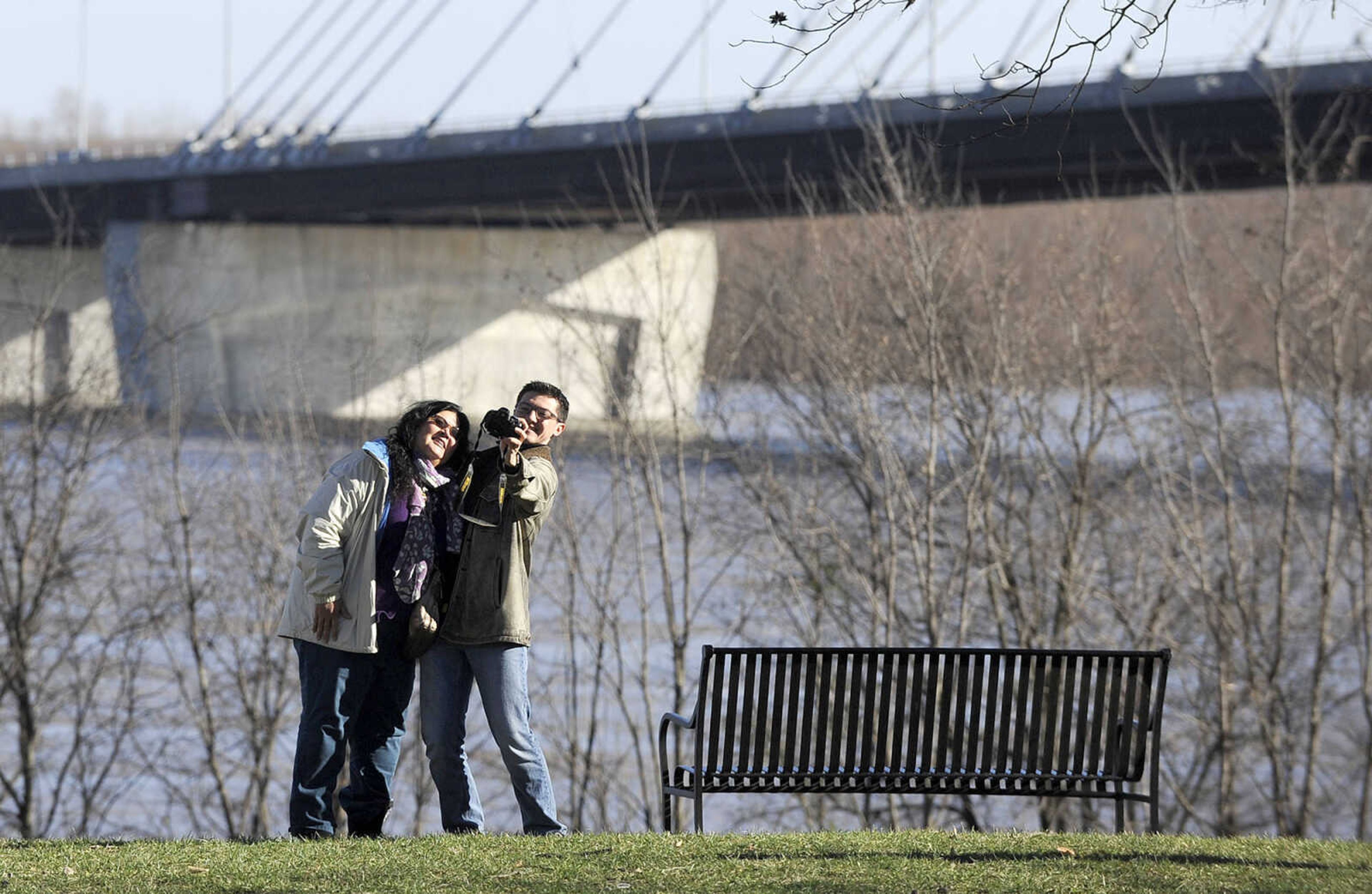 LAURA SIMON ~ lsimon@semissourian.com

People flood to the old Cape Girardeau bridge overlook to catch a glimpse of the swollen Mississippi River, Saturday, Jan. 2, 2016.