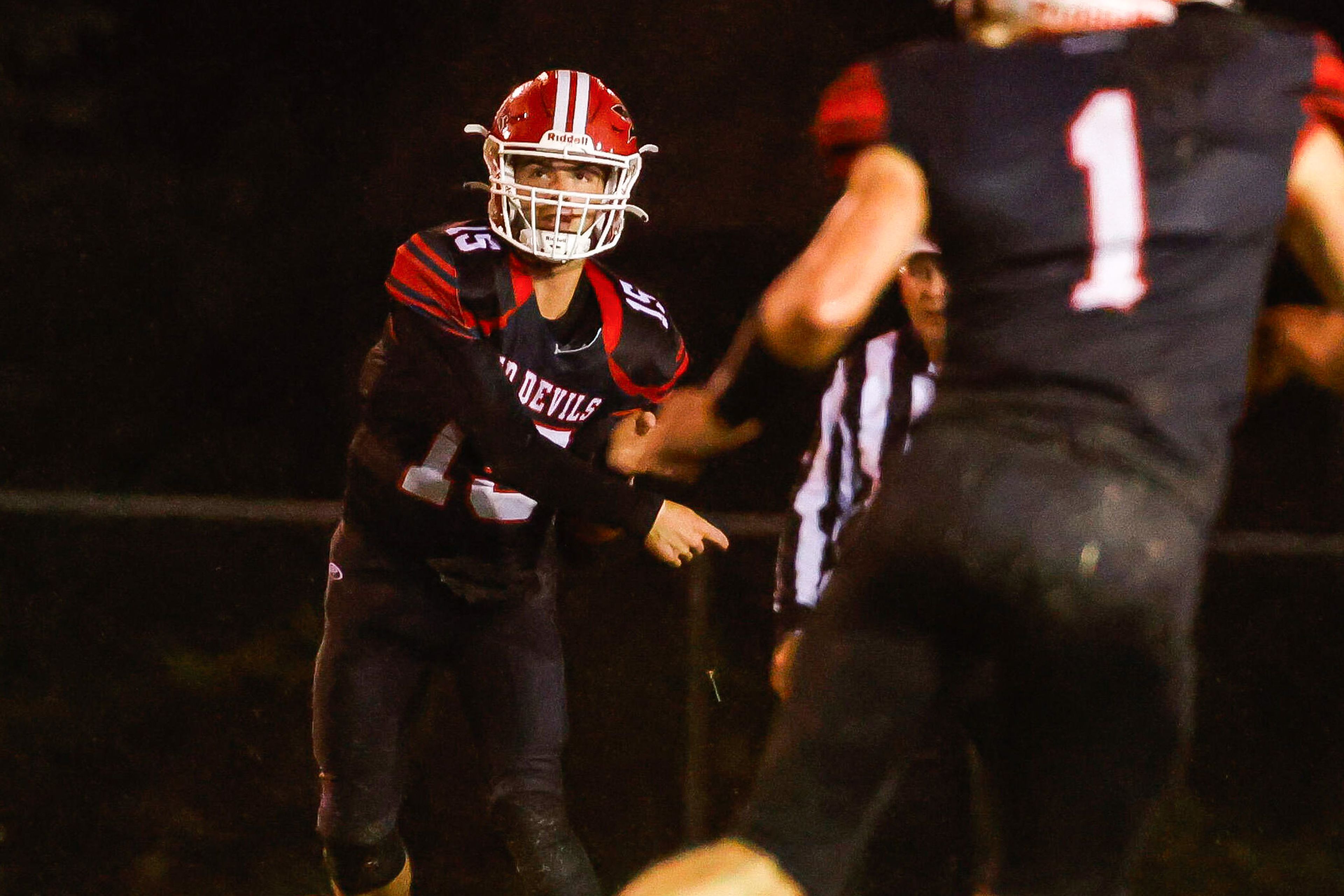 Chaffee's Leyton Hanback (left) sends a pass during a Friday, September 27, 2024 game between the Chaffee Red Devils and the Principia Panthers at Chaffee High School in Chaffee, Mo. Principia defeated Chaffee, 14-6.