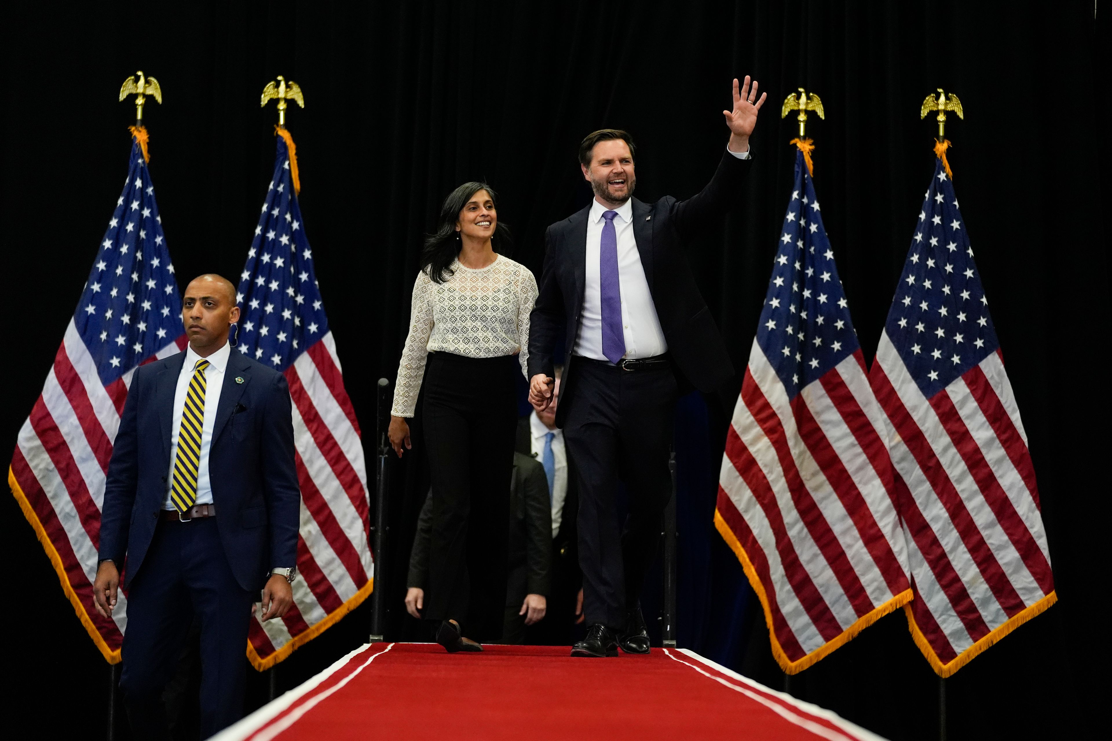 Republican vice presidential nominee Sen. JD Vance, R-Ohio, and his wife Usha Vance, arrive for a campaign event, Wednesday, Oct. 16, 2024, in Williamsport, Pa. (AP Photo/Matt Rourke)