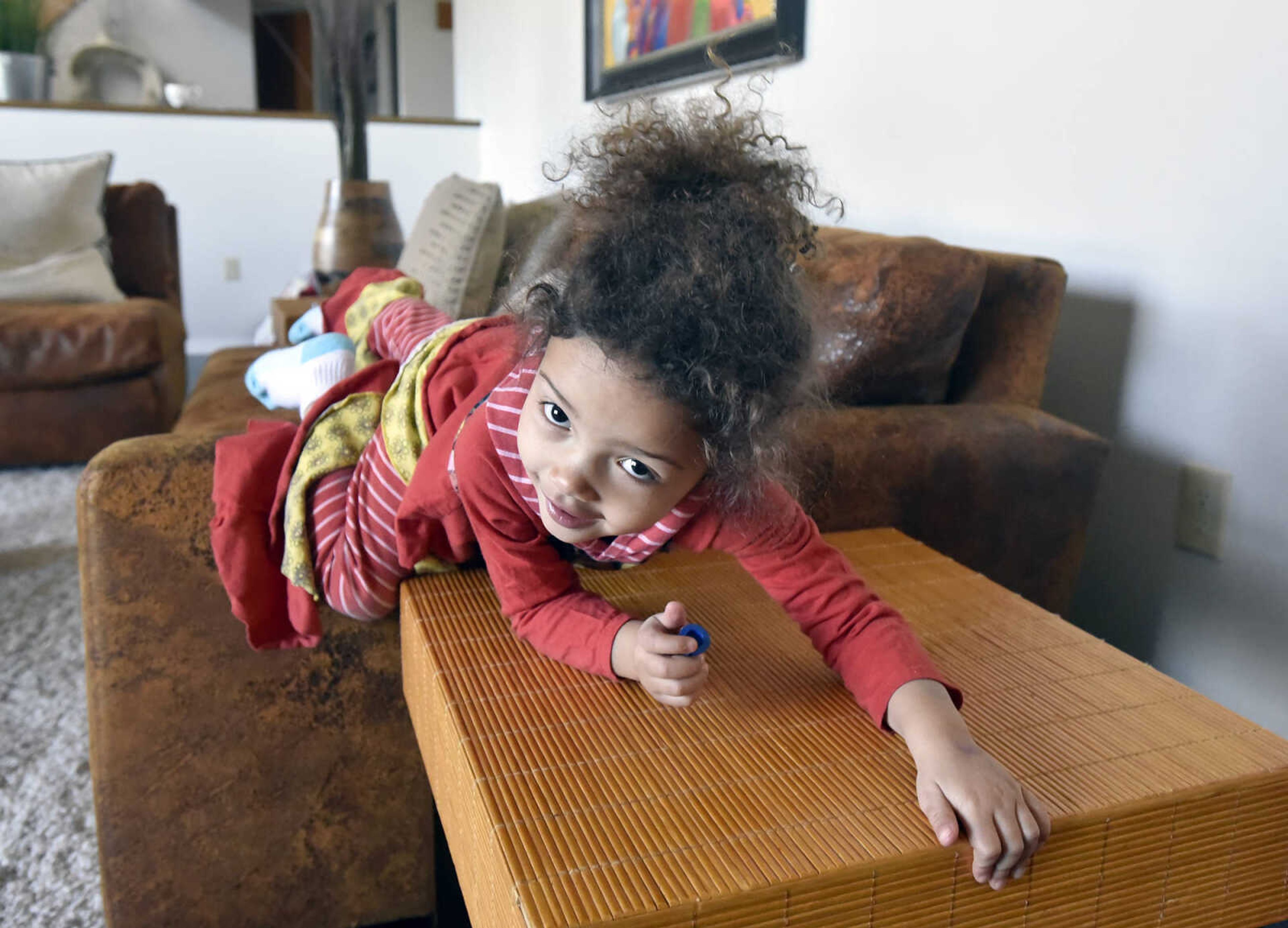 Dolly Becking, 3, plays on the furniture on Saturday, Jan. 28, 2017, at the Becking's Cape Girardeau home.