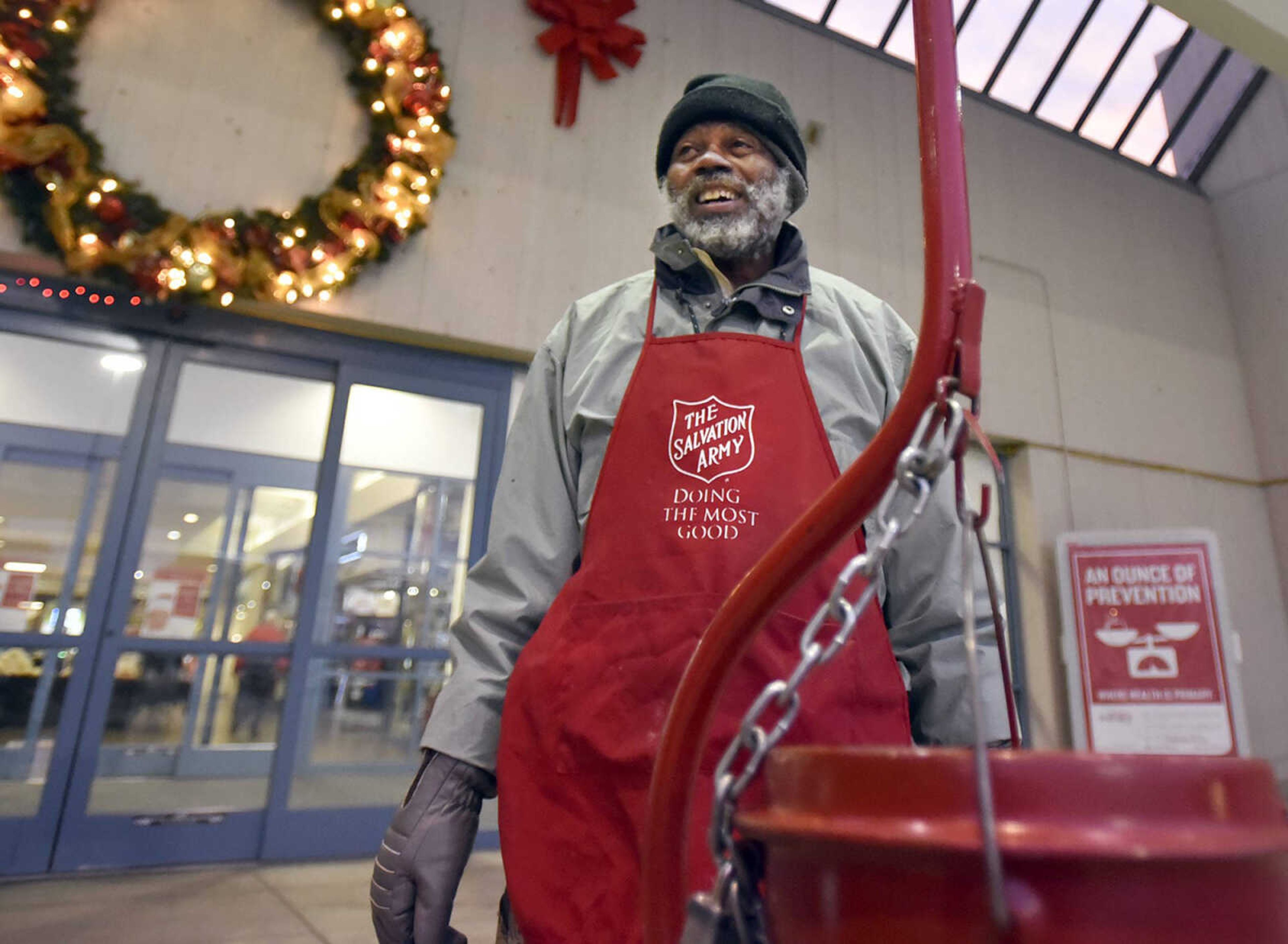 Richard Spicer rings the red-kettle bell for the Salvation Army on Wednesday outside West Park Mall in Cape Girardeau. 