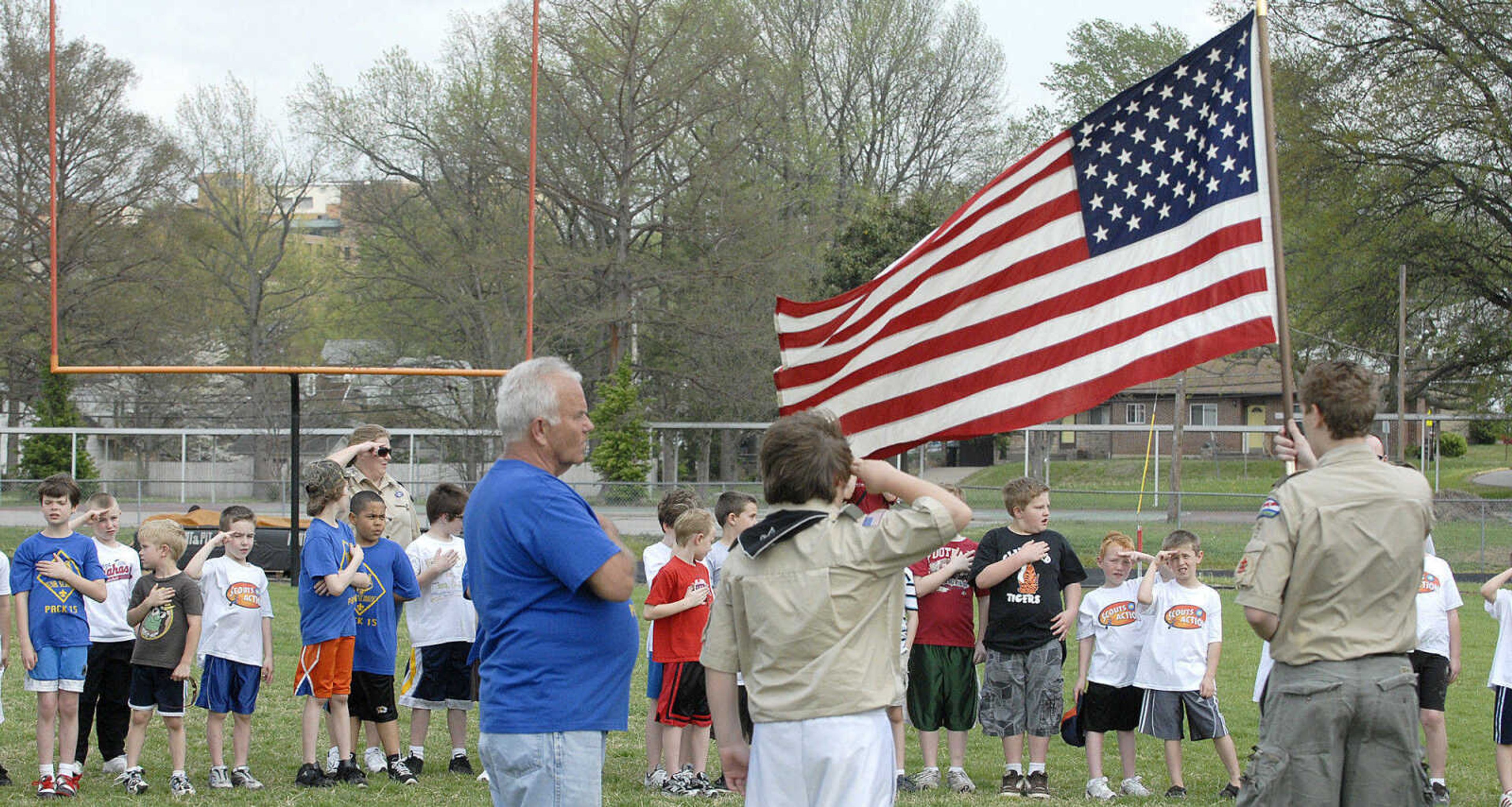 LAURA SIMON~lsimon@semissourian.com
Cub Scouts recite the Pledge of Allegiance Sunday, April 10, 2011 during the Cub Scout track and field day at Cape Central Junior High in Cape Girardeau.