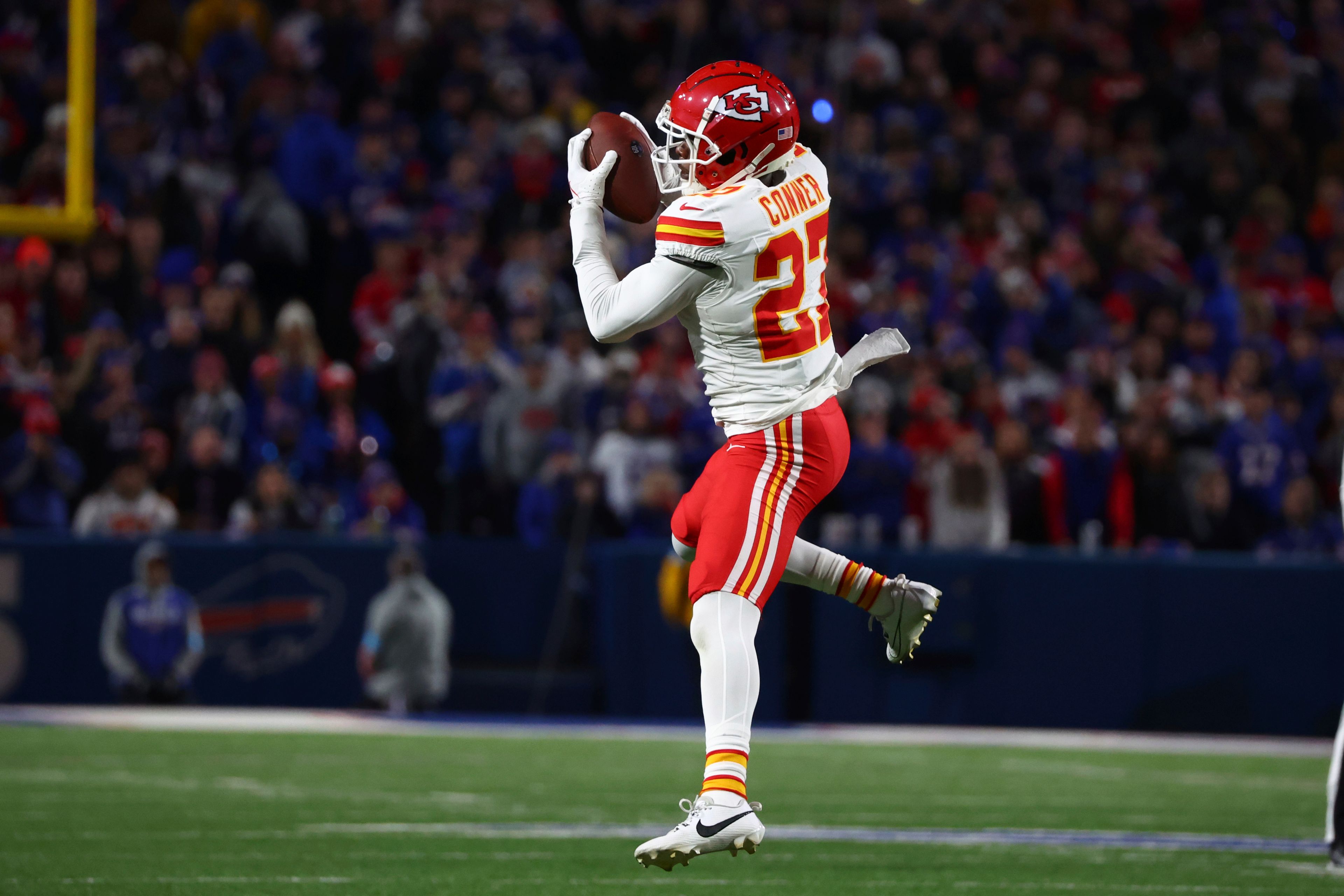 Kansas City Chiefs defensive back Chamarri Conner (27) intercepts a pass during the first half of an NFL football game against the Buffalo Bills Sunday, Nov. 17, 2024, in Orchard Park, N.Y. (AP Photo/Jeffrey T. Barnes)