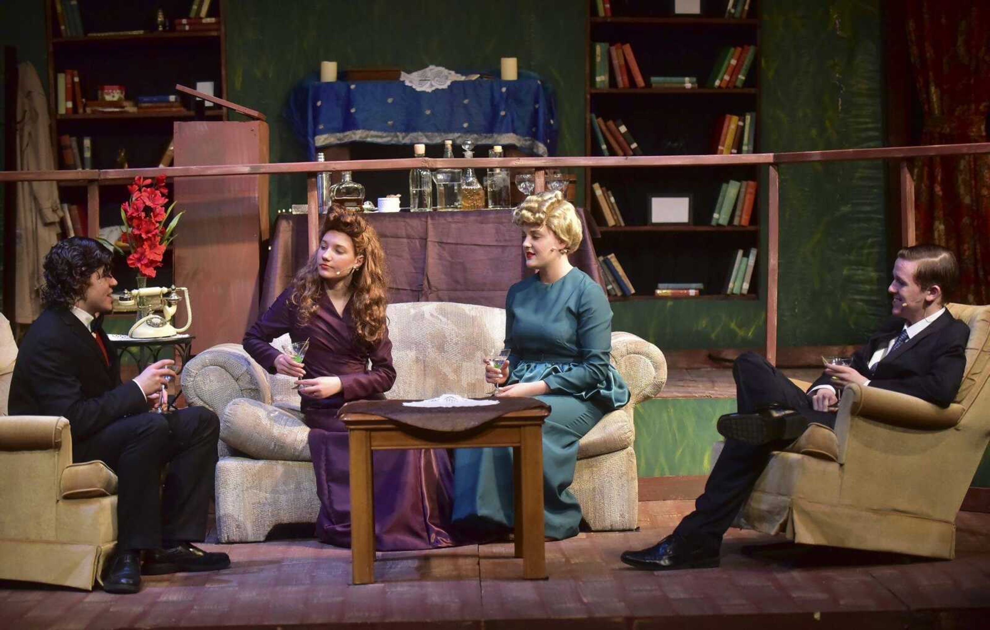 From left, River Ketcherside as Charles Condomine, Jacqui Lang as Ruth Condomine, Tessa Johnson as Mrs. Bradman and Zac Glenn as Dr. Bradman act out a scene during a dress rehearsal for the play Blithe Spirit at the Richard D. Kinder Performance Hall at Cape Central High School in Cape Girardeau.