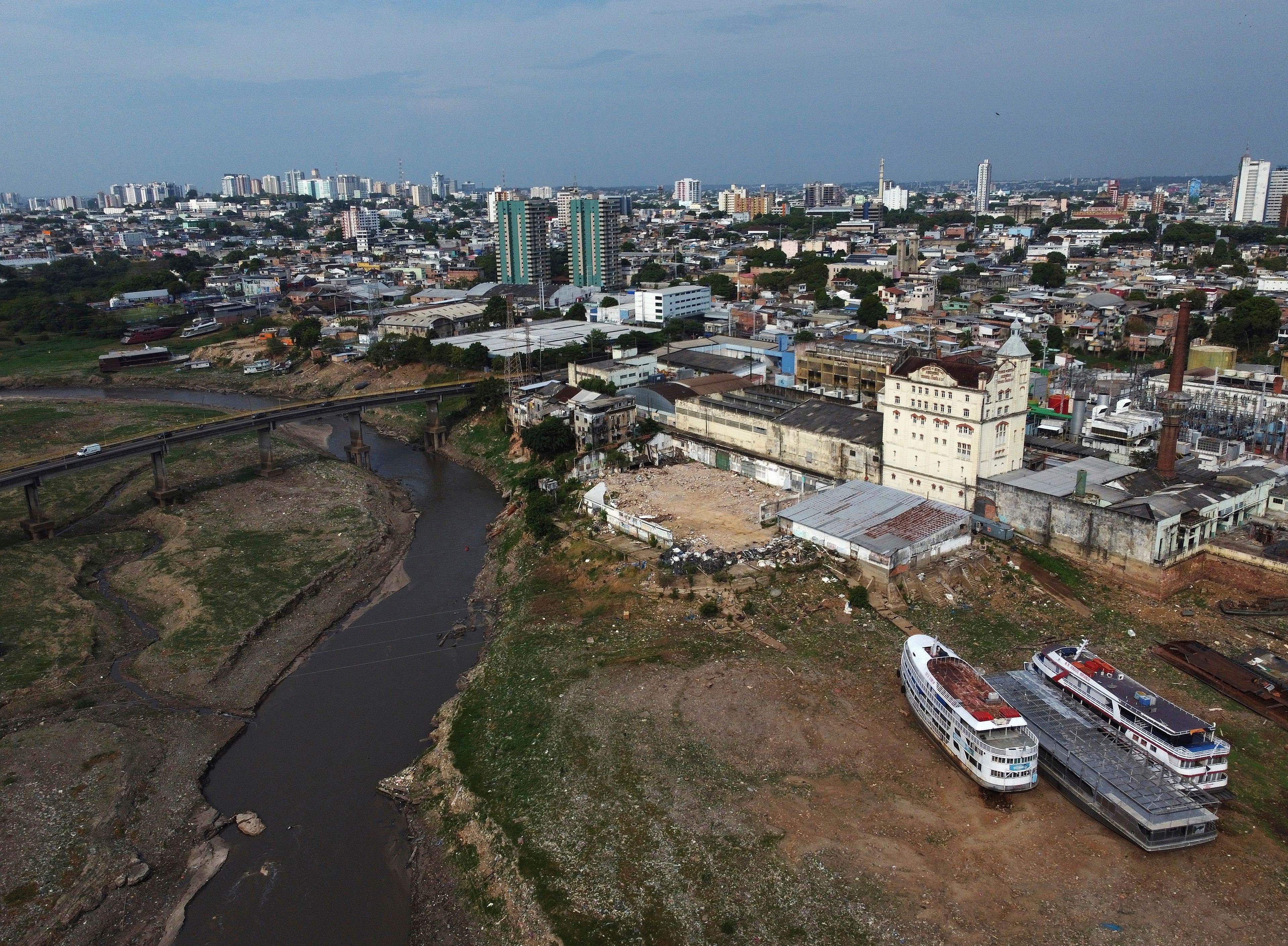 Part of the Sao Raimundo that connects to the Negro River is visible amid a drought in Manaus, state of Amazonas, Brazil, Wednesday, Sept. 25, 2024. (AP Photo/Edmar Barros)