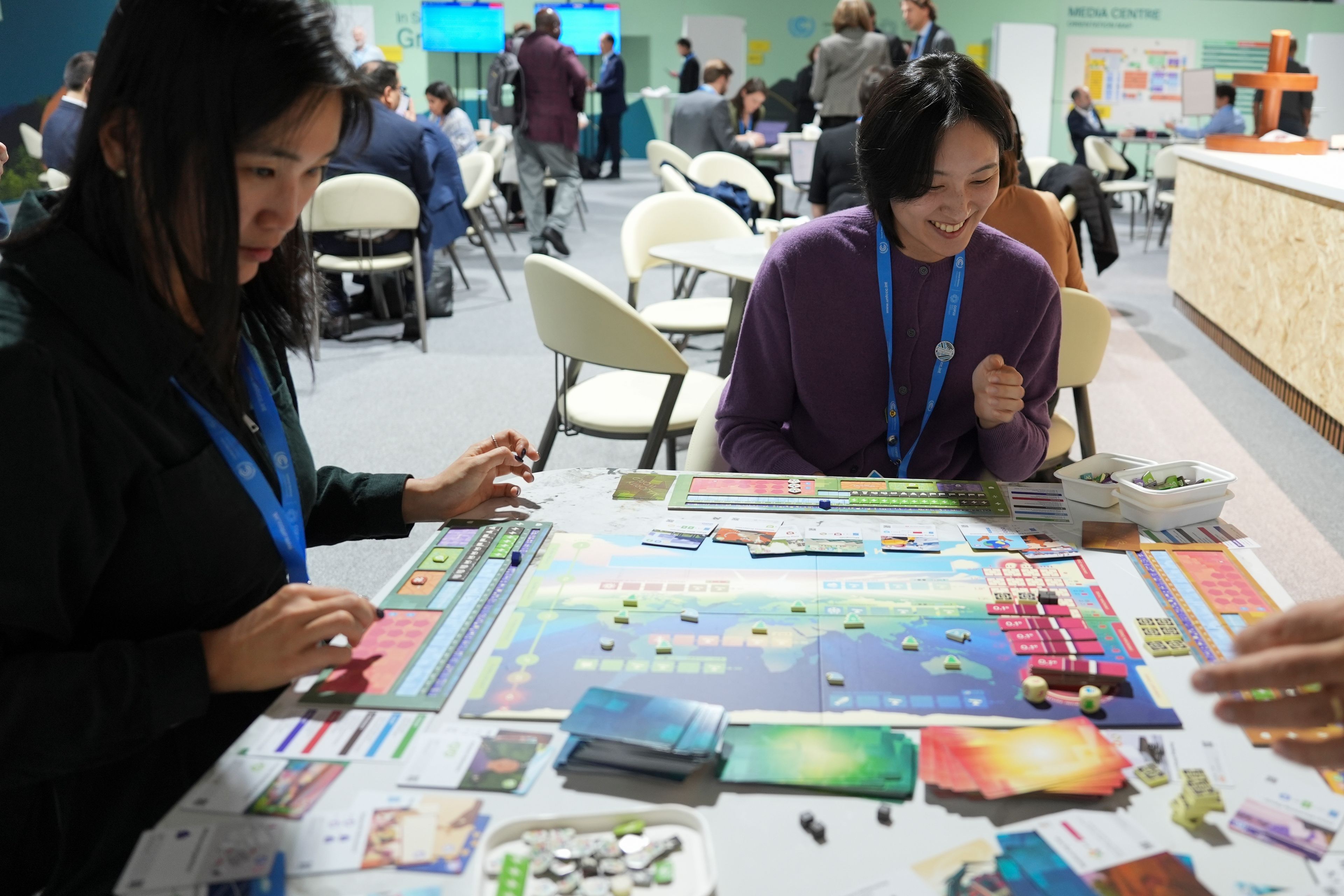 In a board game, climate experts work to save the world, which diplomats at COP29 try in real life