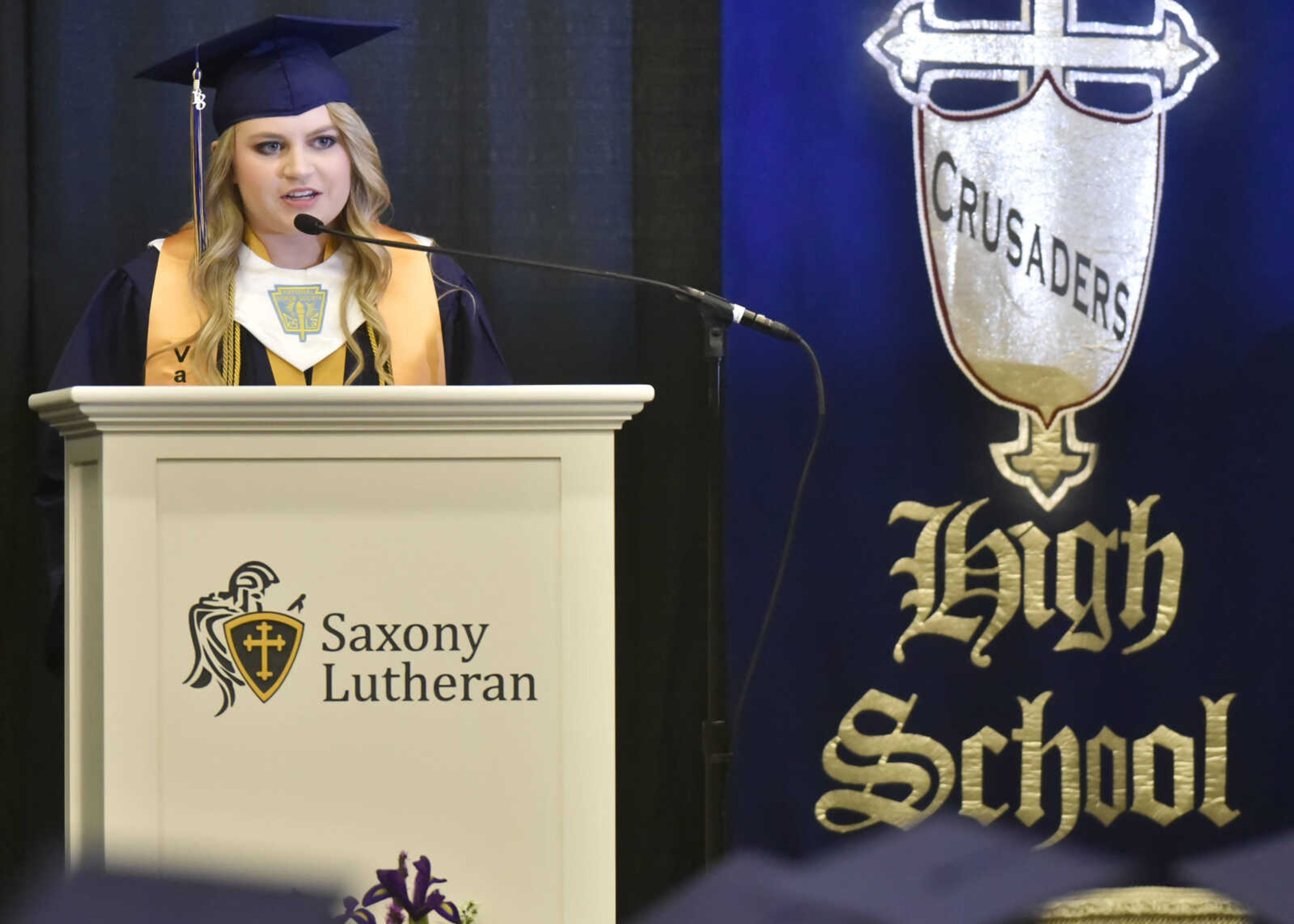 One of seven valedictorians, Emma Robison gives her valedictory address Sunday, May 20, 2018 at Saxony Lutheran High School in Jackson.