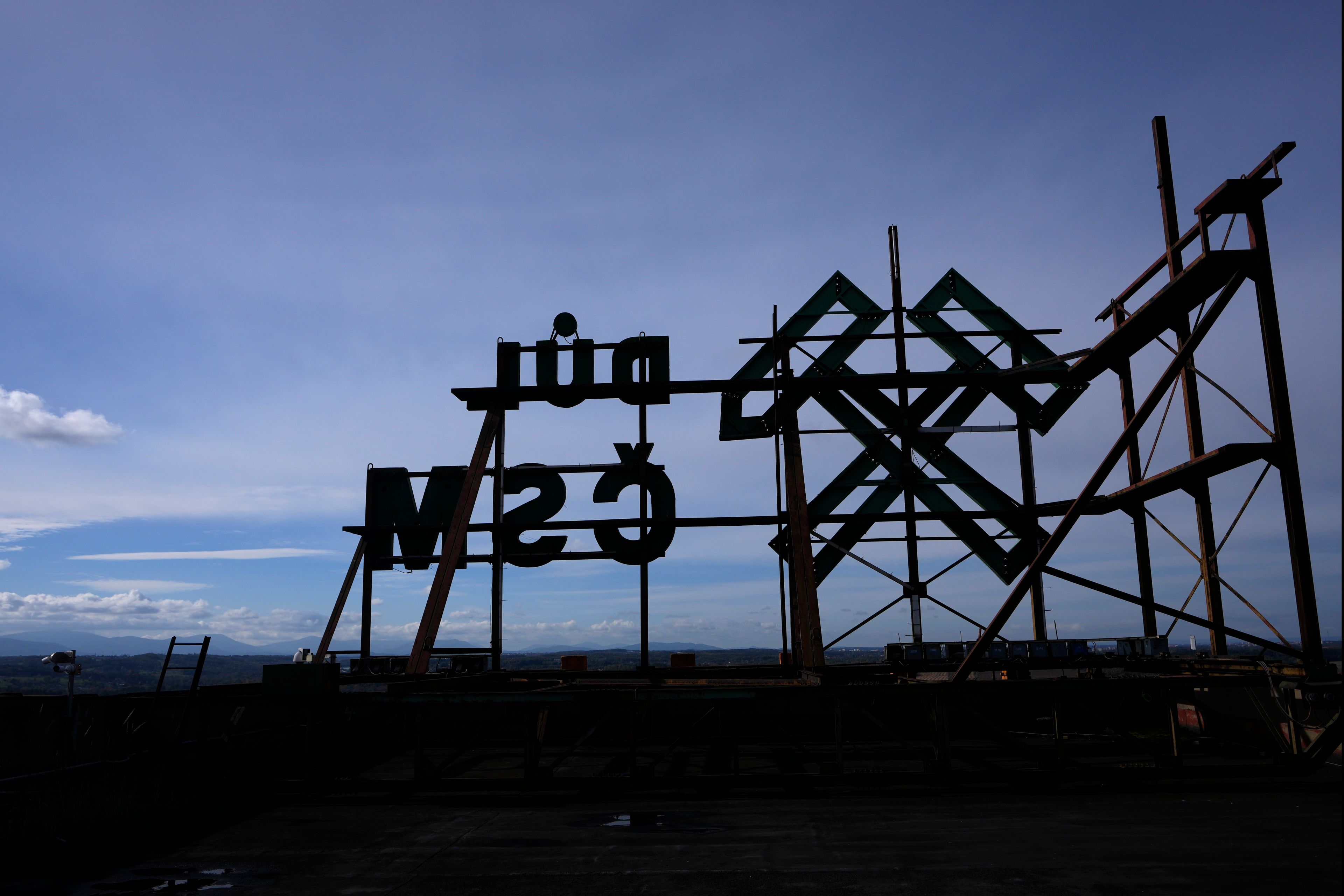 A logo of the CSM coal mine is displayed on the roof in Stonava, Czech Republic, Monday, Oct. 14, 2024. (AP Photo/Petr David Josek)