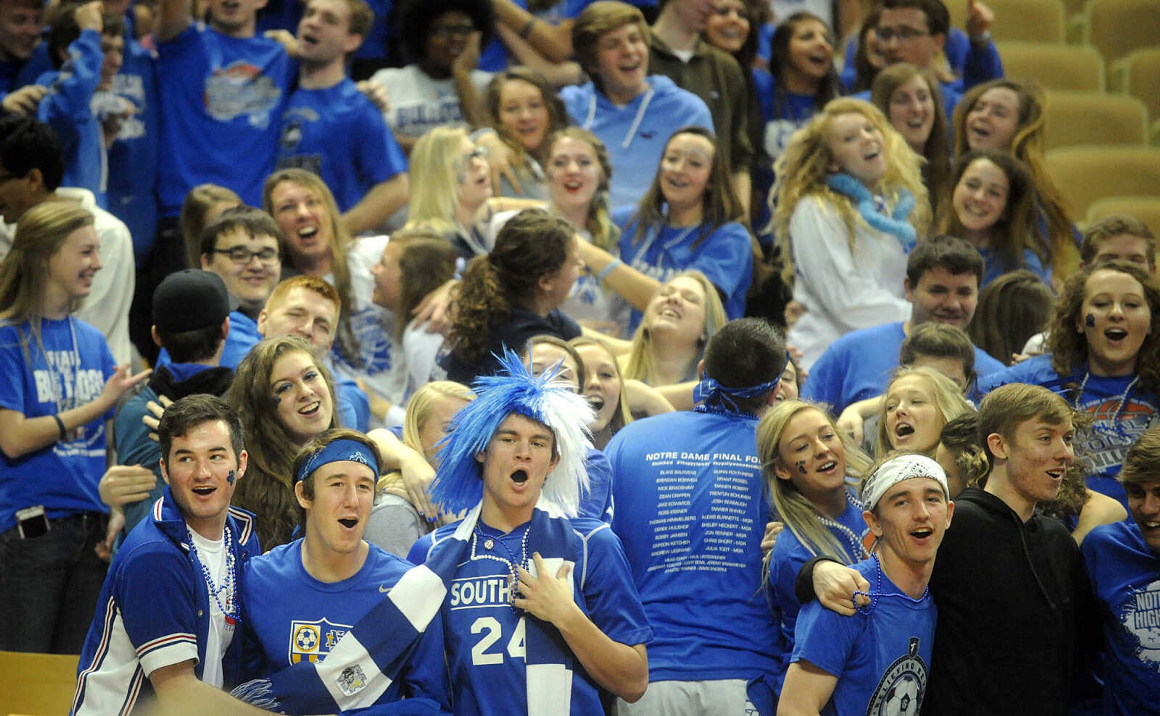 Notre Dame fans cheer on the Bulldogs during a Class 4 third-place game against Bolivar, Friday, March 20, 2015, in Columbia, Missouri. Notre Dame won 65-44. (Laura Simon)