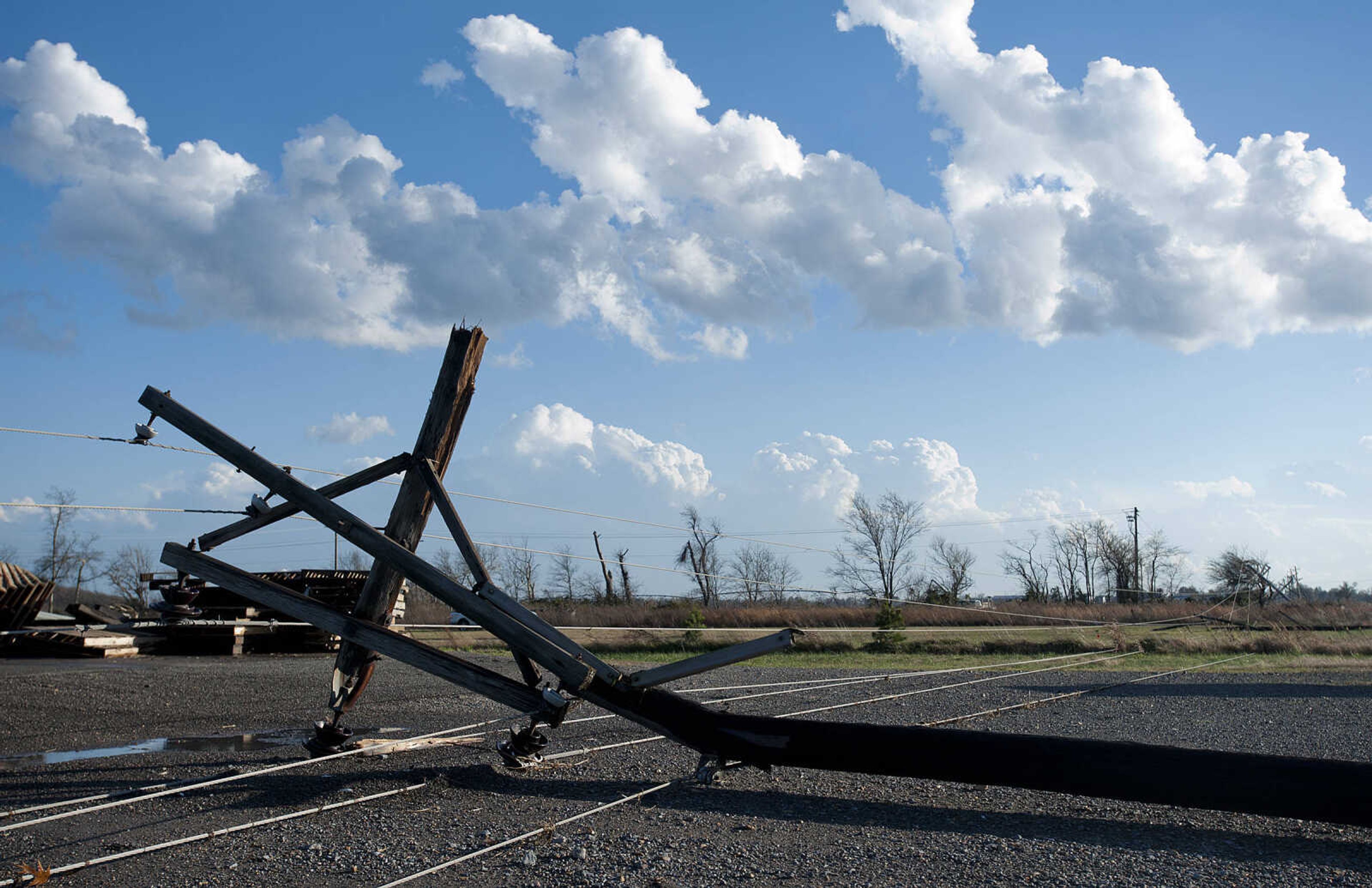 A utility pole lies in the parking lot of Cookson Seeds, 22090 Highway 61, after a severe thunderstorm struck the area Sunday, Nov. 17, south of Morley, Mo. The storm destroyed the business, two mobile homes and damaged several others.