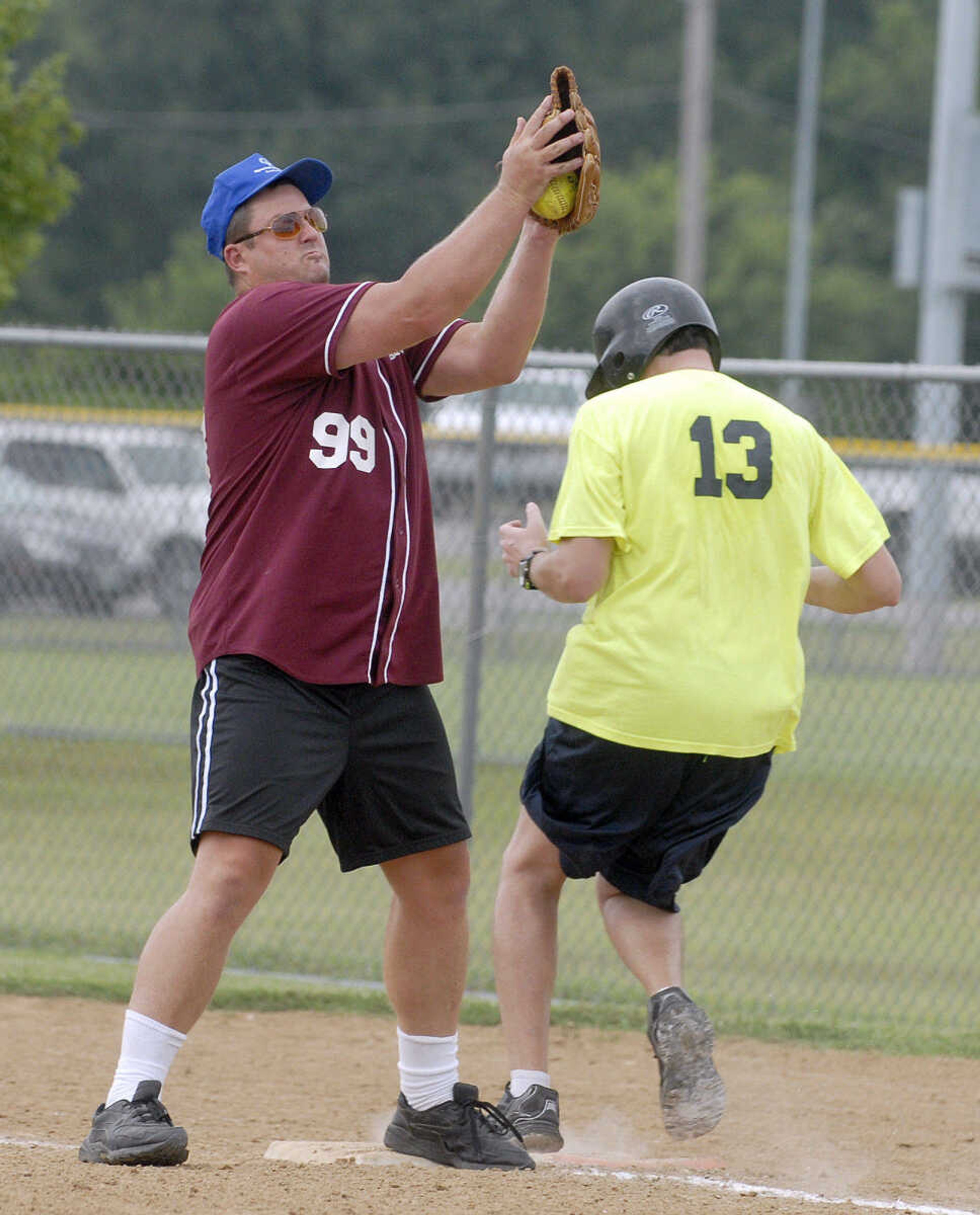 LAURA SIMON ~ lsimon@semissourian.com
Fort Zumwalt's Kenny Anderson attempts the out at first Saturday, August 13, 2011 during the Special Olympics State Outdoor Championship at Shawnee Sports Complex in Cape Girardeau.