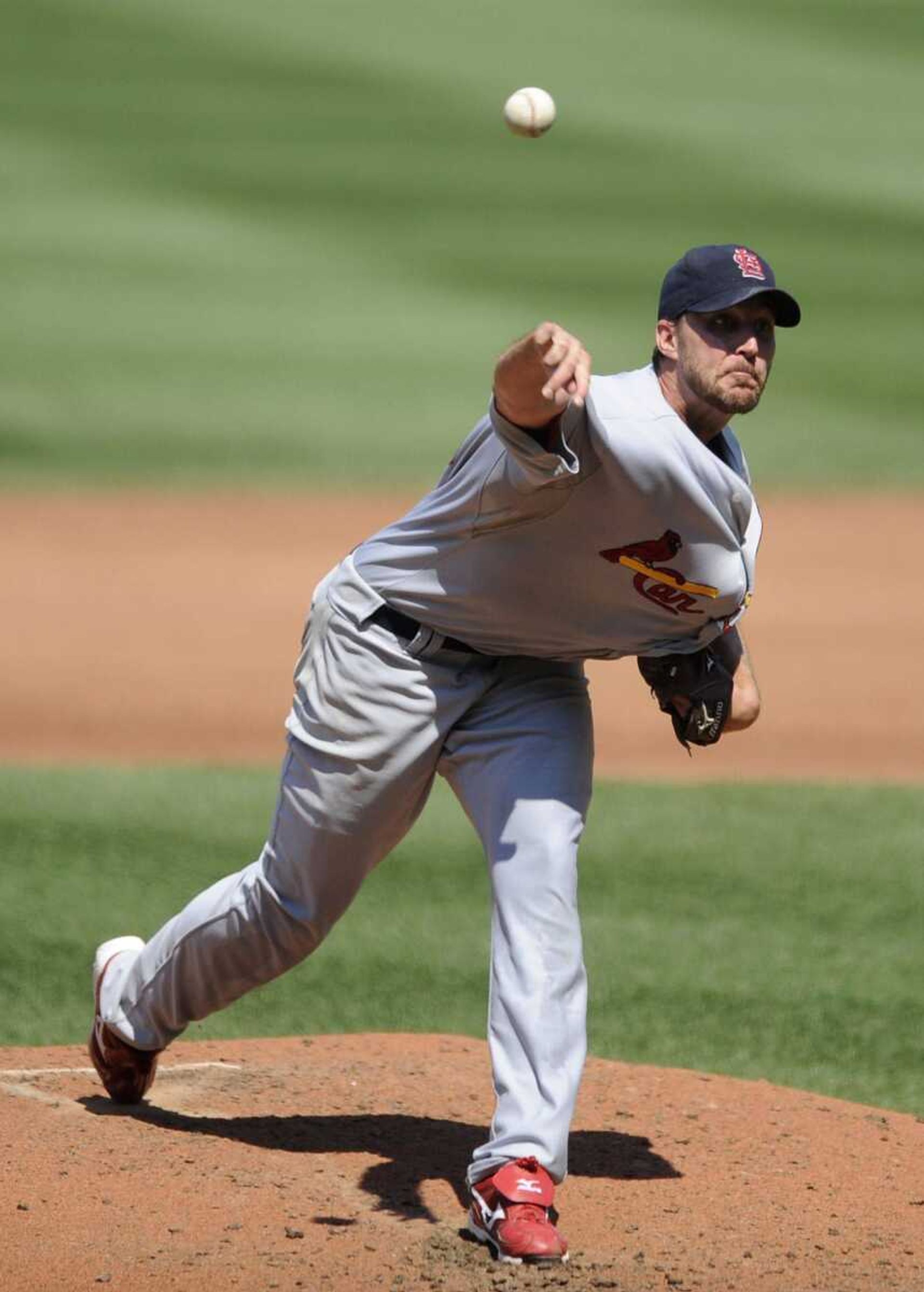 Cardinals starter Adam Wainwright delivers a pitch to a Nationals batter during the third inning Sunday in Washington. Wainwright surrendered six hits and four earned runs in five innings as he failed for the third time to win his 18th game. (Nick Wass ~ Associated Press)