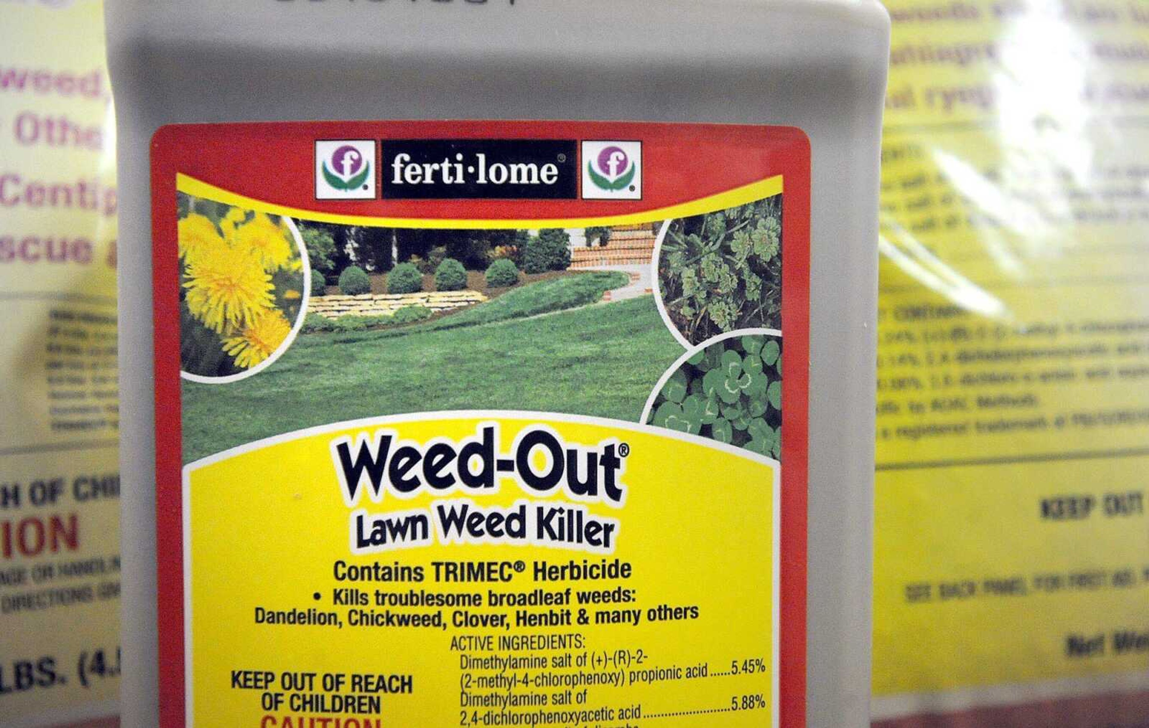 Products such as these can help rid your lawn of weeds. (Laura Simon)