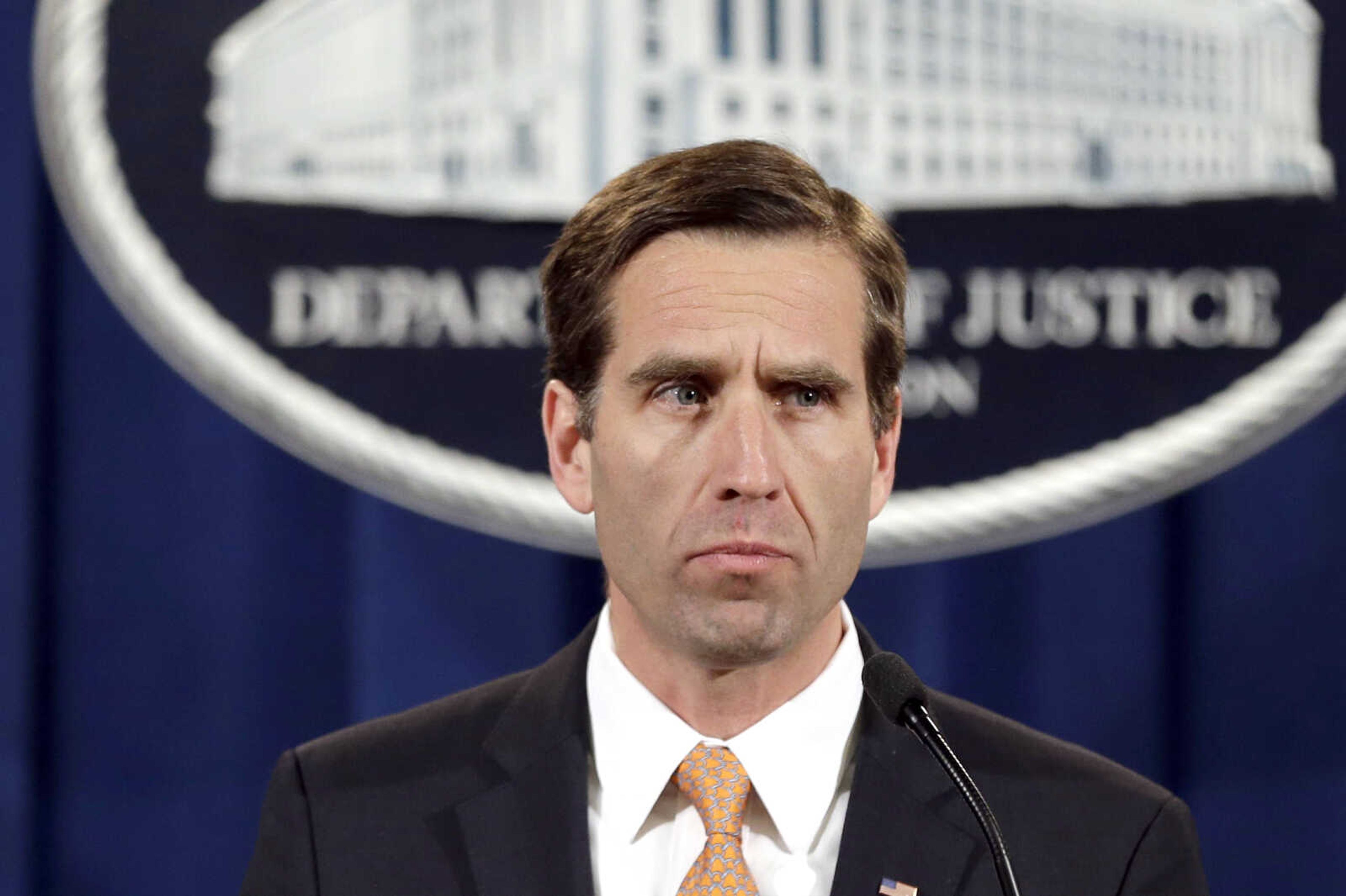 Delaware Attorney General Beau Biden pauses while speaking at a news conference at the Justice Department on Feb. 5, 2013, in Washington. (Jacquelyn Martin ~ Associated Press)