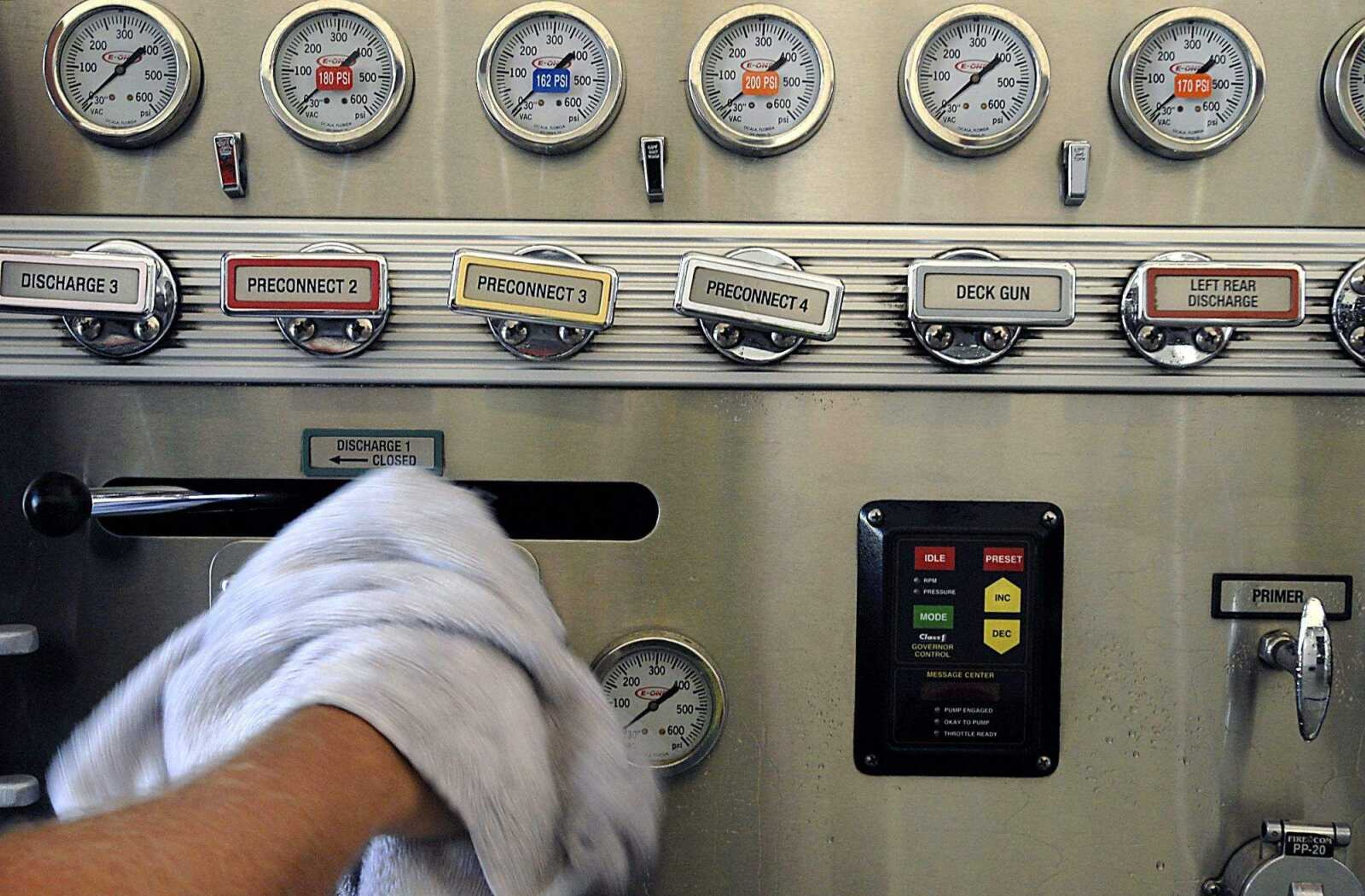 KIT DOYLE ~ kdoyle@semissourian.com
Firefighters wash engines every day at Station 1. Tuesday evening, June 17, 2008, a control panel was dried.