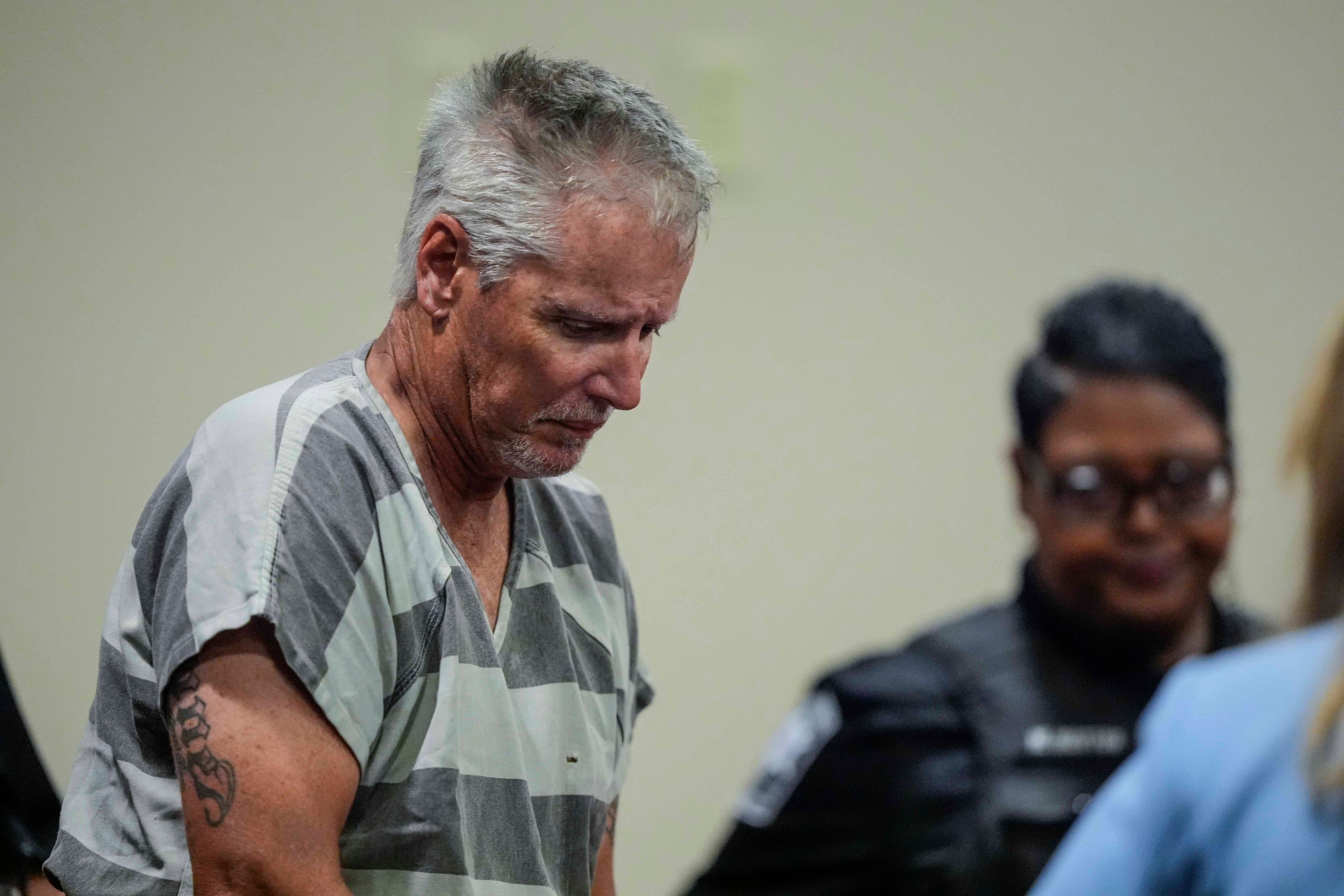 Colin Gray, 54, the father of Apalachee High School shooter Colt Gray, 14, enters the Barrow County courthouse for his first appearance, on Friday, Sept. 6, 2024, in Winder, Ga. (AP Photo/Brynn Anderson)