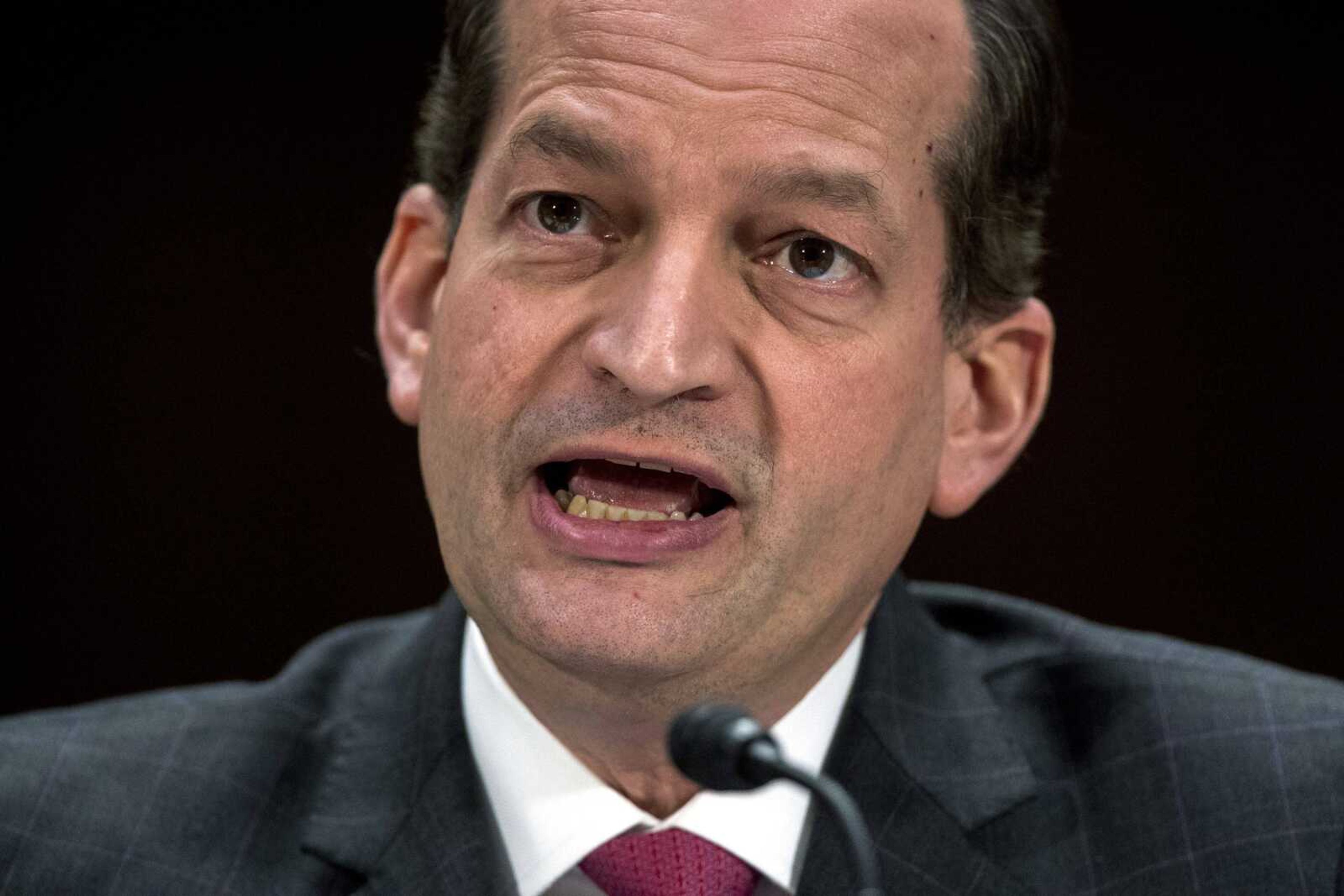 Labor Secretary Alex Acosta speaks during a Senate committee hearing on Capitol Hill in Washington. The Trump administration is preparing to announce a new insurance option for small firms and self-employed people to cost less but possibly cover fewer benefits than current plans.