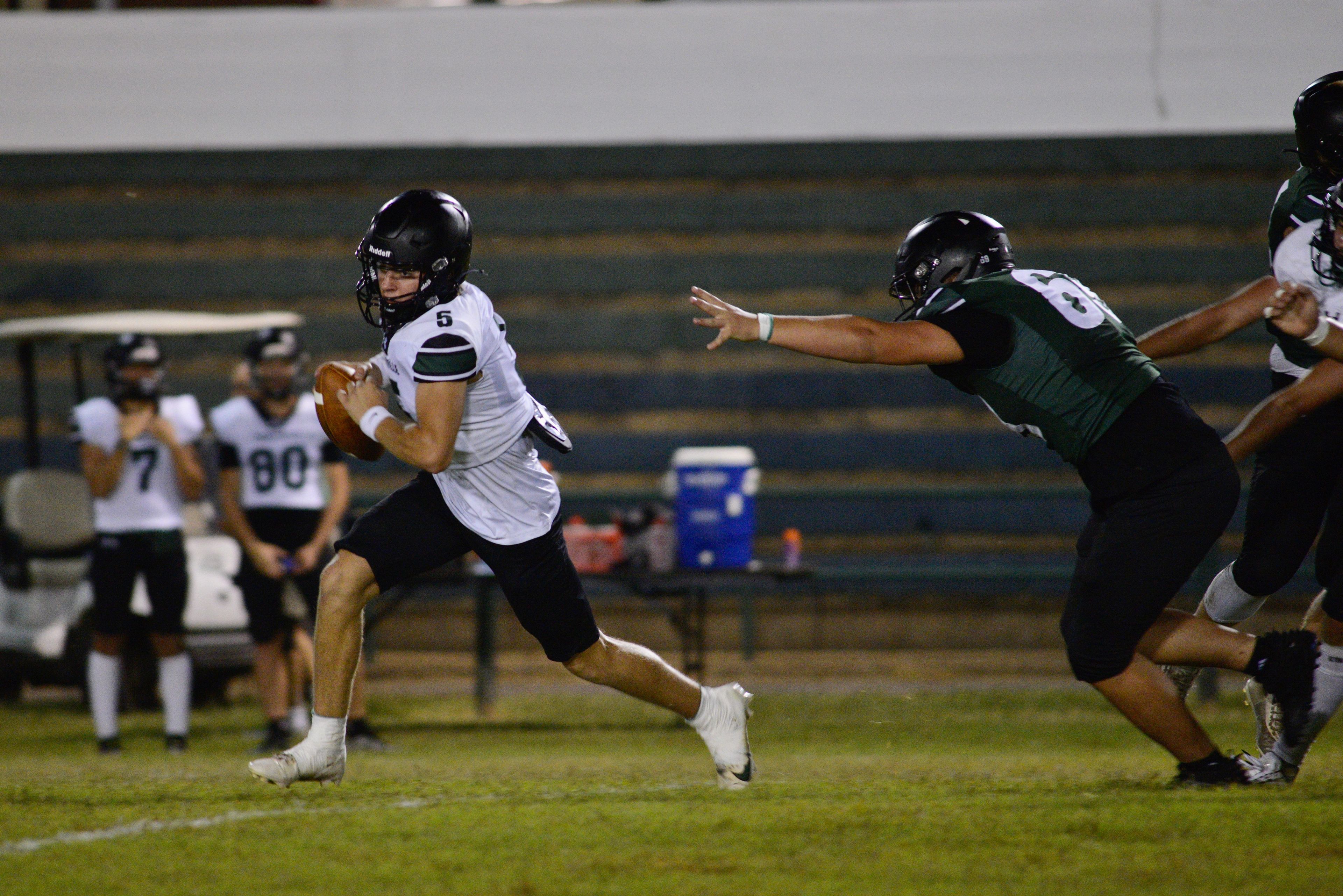 Perryville quarterback Kayd Luckey scrambles during the Midnight Game on Saturday, Aug. 17, at Perryville High School.