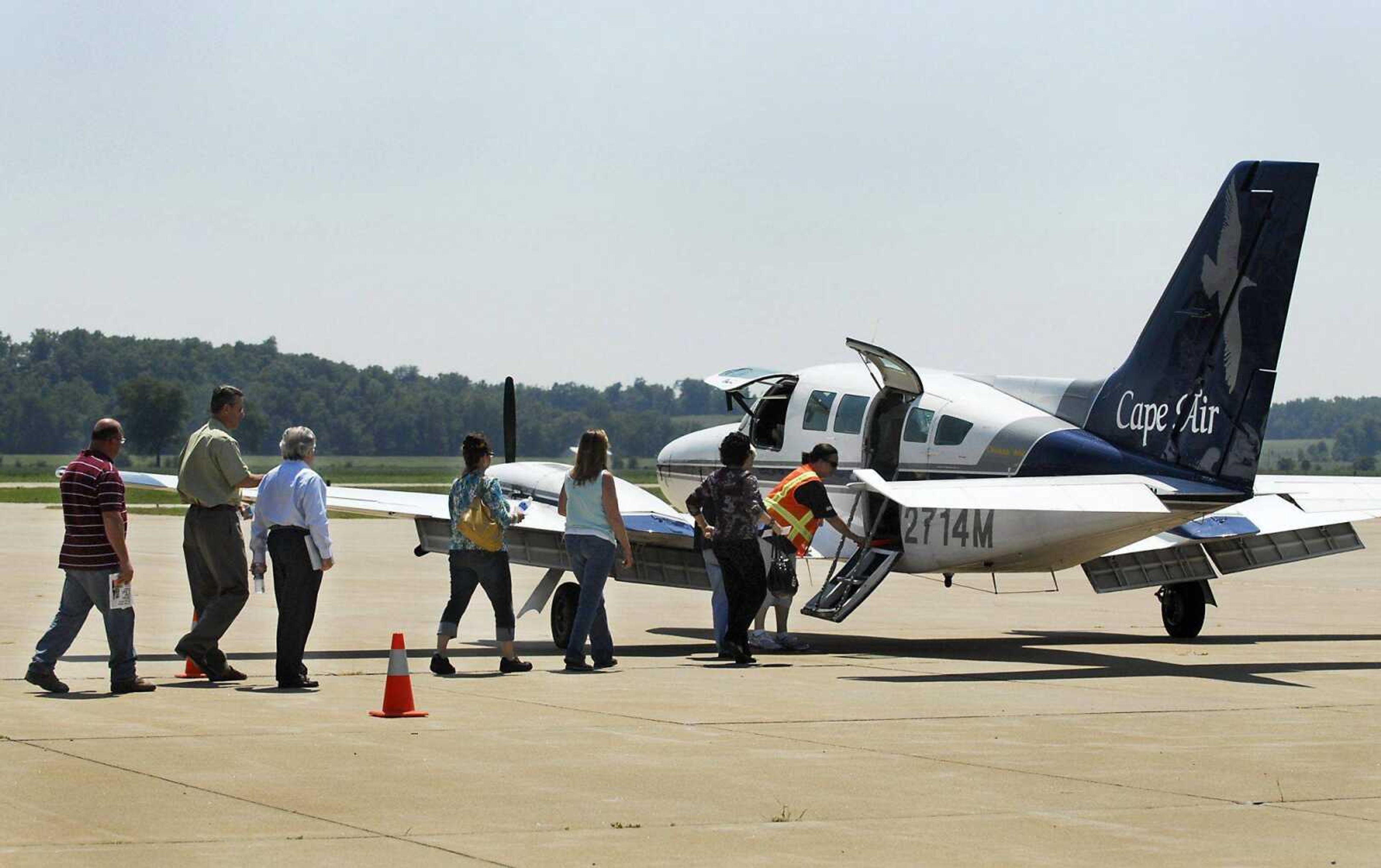 Passengers load onto a Cape Air plane leaving the Cape Girardeau Regional Airport on Friday afternoon. The airline offers four flights a day to St. Louis during the week. (Kristin Eberts)