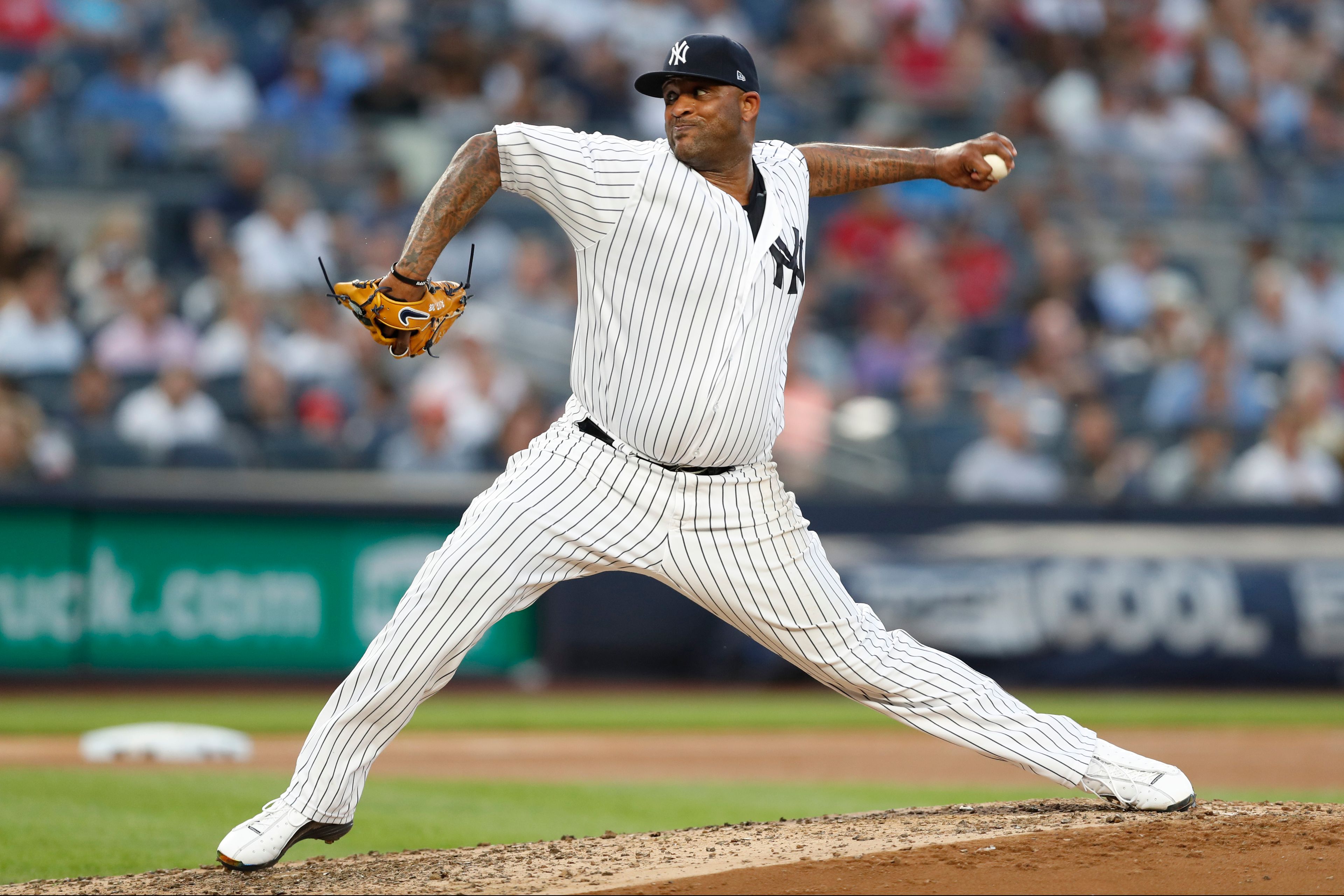 FILE - New York Yankees starting pitcher CC Sabathia throws during the fourth inning of the team's baseball game against the Tampa Bay Rays, July 16, 2019, in New York. (AP Photo/Kathy Willens, file)