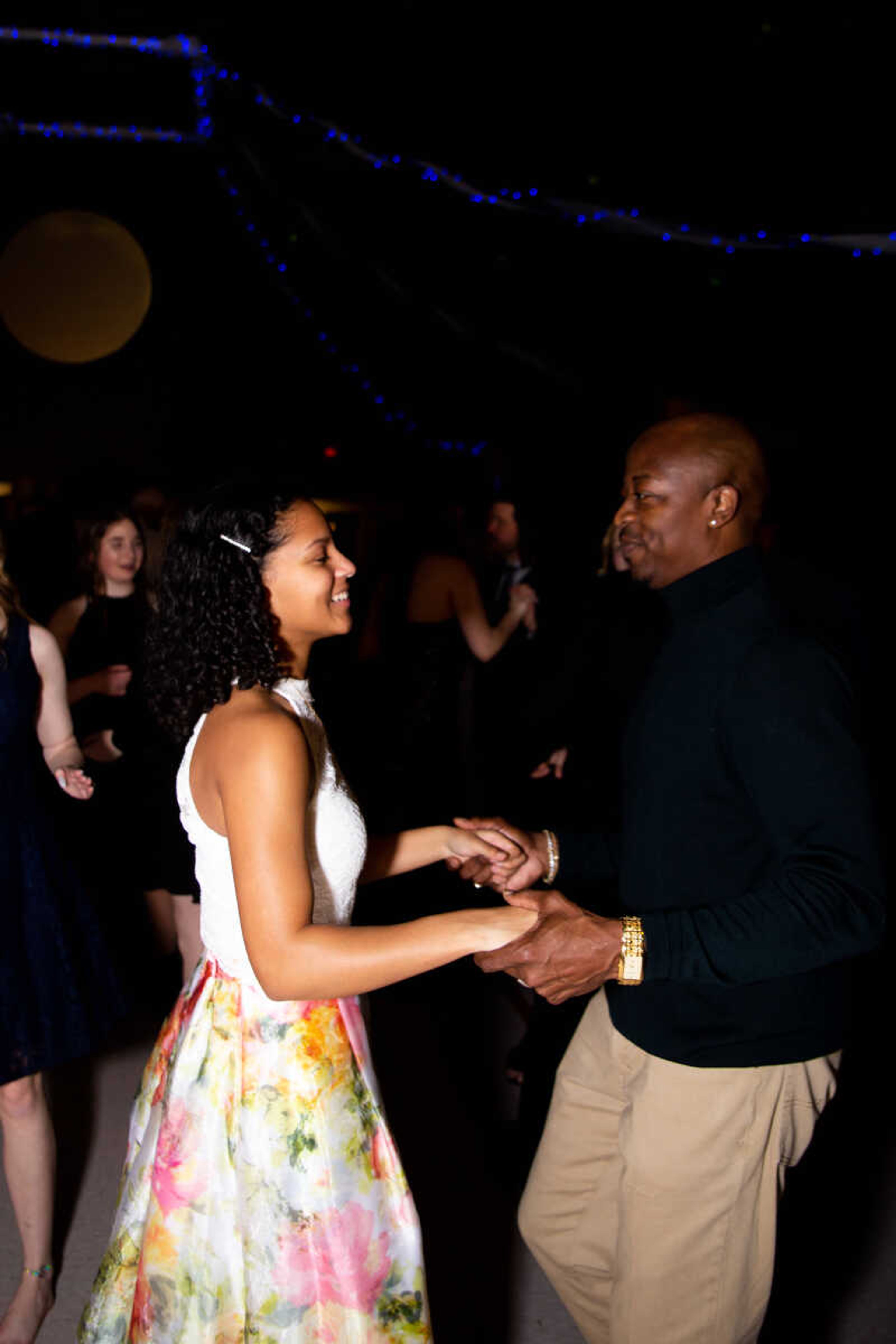 Fabian Gordon dances with his daughter Jada Gordon, 16, at the father daughter dance.