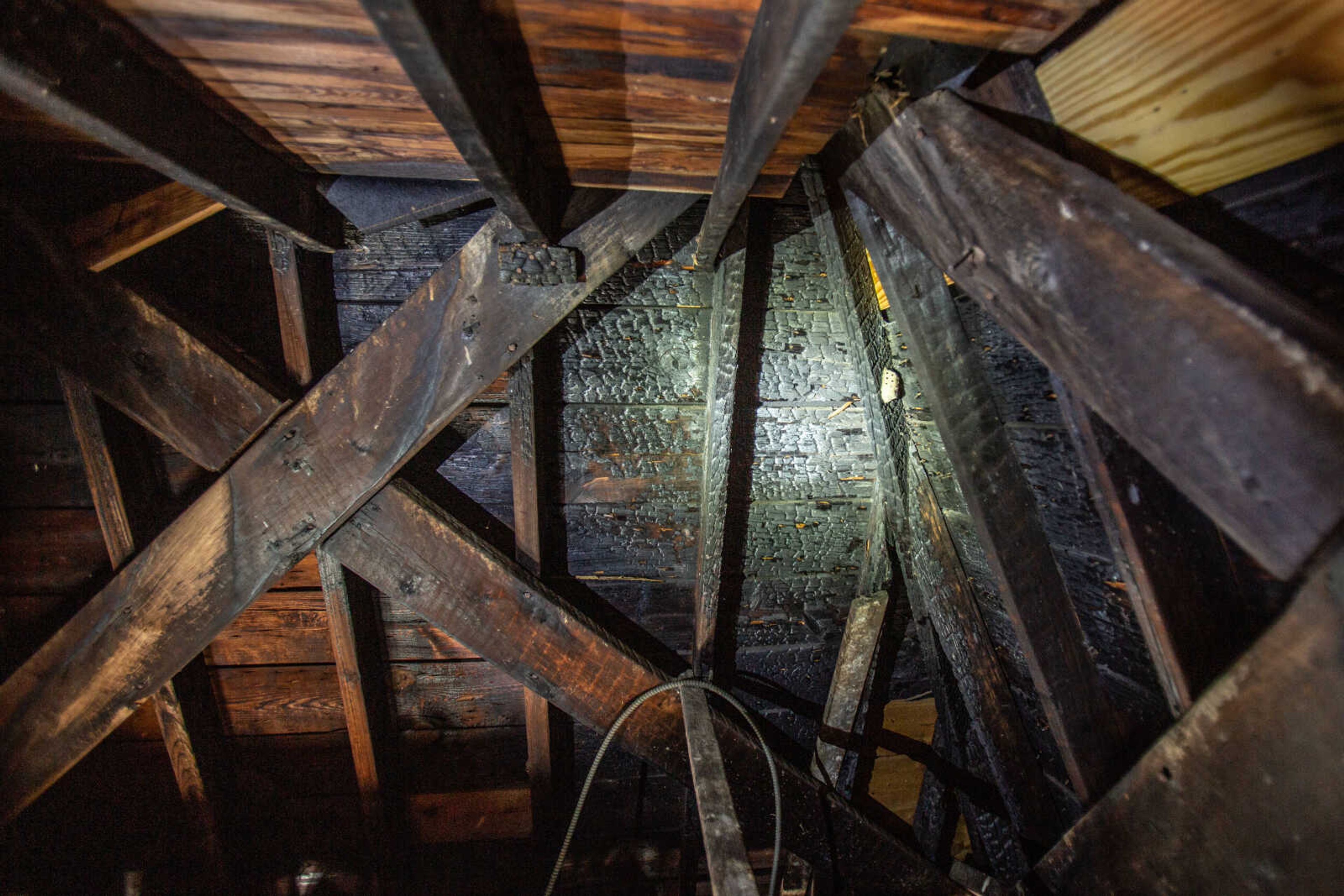 Wood remains charred on in the cupola of the Common Pleas Courthouse on Tuesday, June 16, 2020.