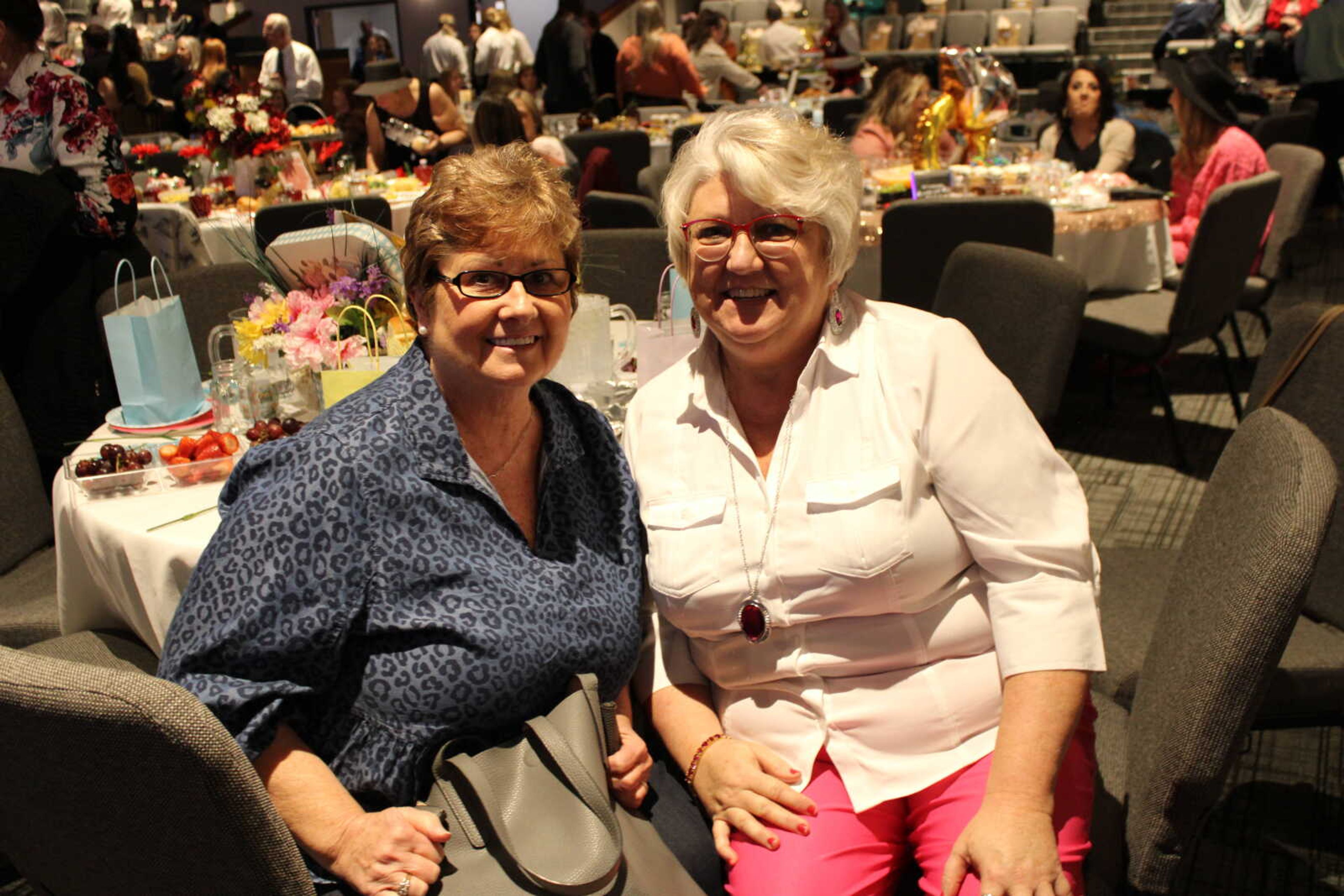 Susabelle Crowly and Sharon Hodgekiss pose together at the tea party.