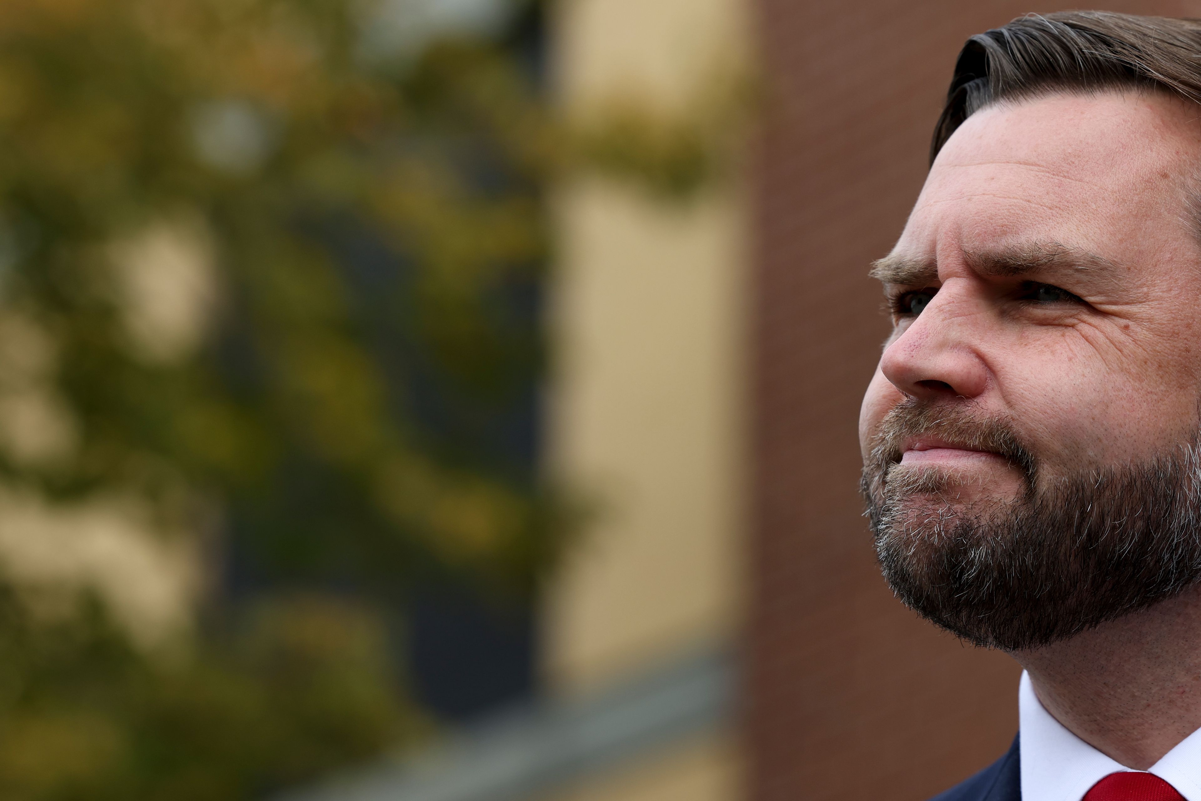 Republican vice presidential nominee Sen. JD Vance, R-Ohio, speaks in front of the Minneapolis police department's 3rd precinct, which was ransacked and burned after the murder of George Floyd in 2020, Monday, Oct. 14, 2024, in Minneapolis. (AP Photo/Ellen Schmidt)