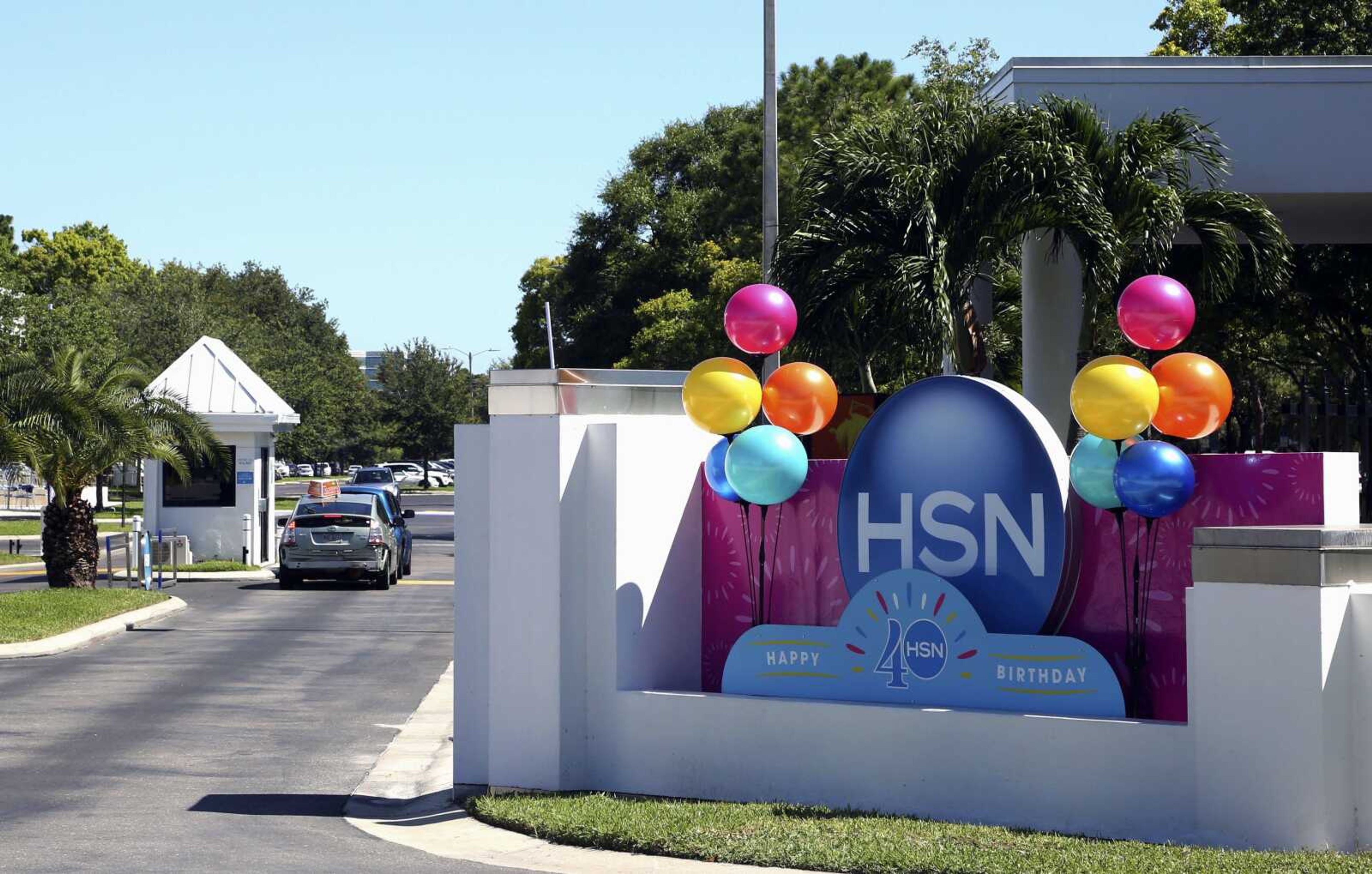 A sign outside of the headquarters of the Home Shopping Network is seen Thursday in St. Petersburg, Florida.