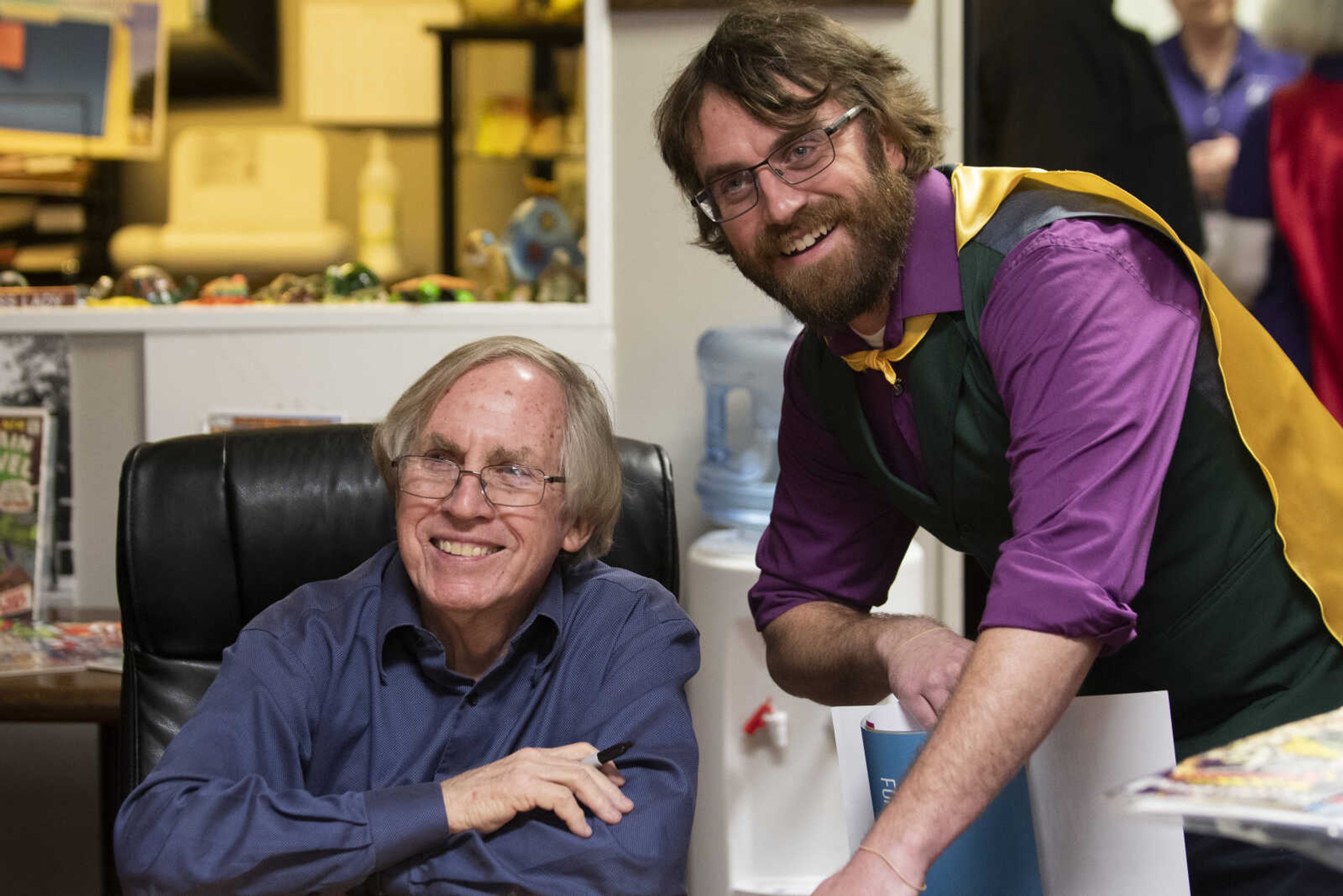 Former editor-in-chief of Marvel Comics and Jackson native Roy Thomas has his picture taken with Tyler Wolfsberger, president of the Uptown Jackson Revitalization Organization, on Saturday, Feb. 23, 2019, at the Cape Girardeau County History Center in Jackson.&nbsp;