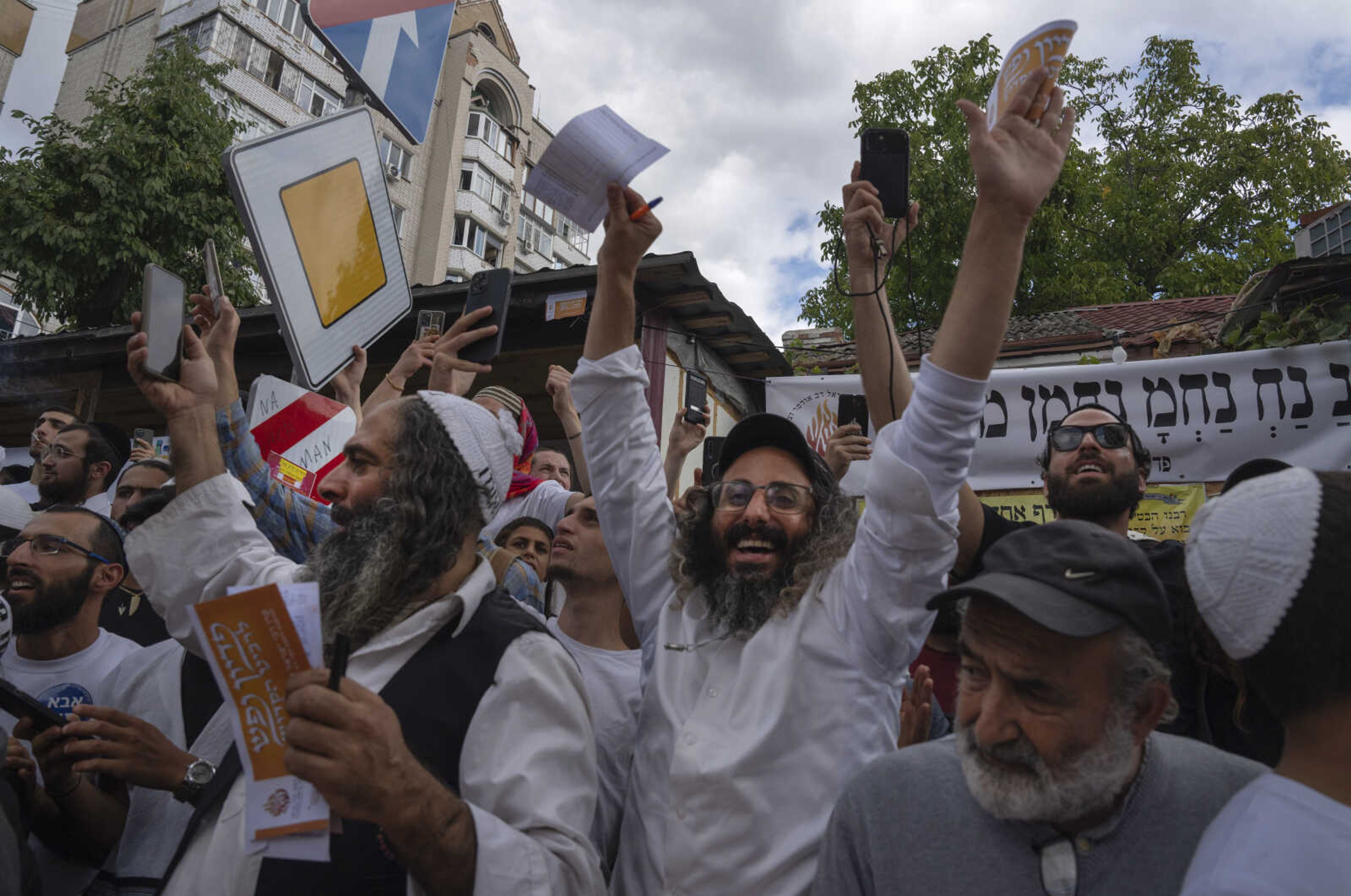 Orthodox Jews gather at the tomb of Rabbi Nachman, the great grandson of the founder of Hasidic movement, in the town of Uman, 200 kilometers (125 miles) south of Ukraine's capital Kyiv, Ukraine, Friday, Sept. 15, 2023. Thousands of Hasidic Jewish pilgrims flocked to central Ukraine to mark the Jewish new year Sunday, ignoring international travel warnings as Russia struck more targets from the air . (AP Photo/Efrem Lukatsky)